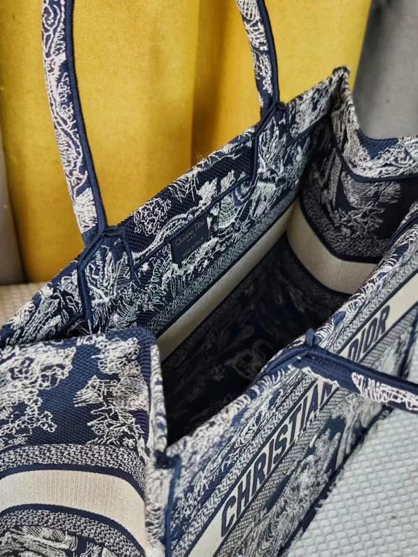 large D*or book tote blue and ecru toile de jouy reverse embroidery 16.5 x 14 x 7.5 inches
