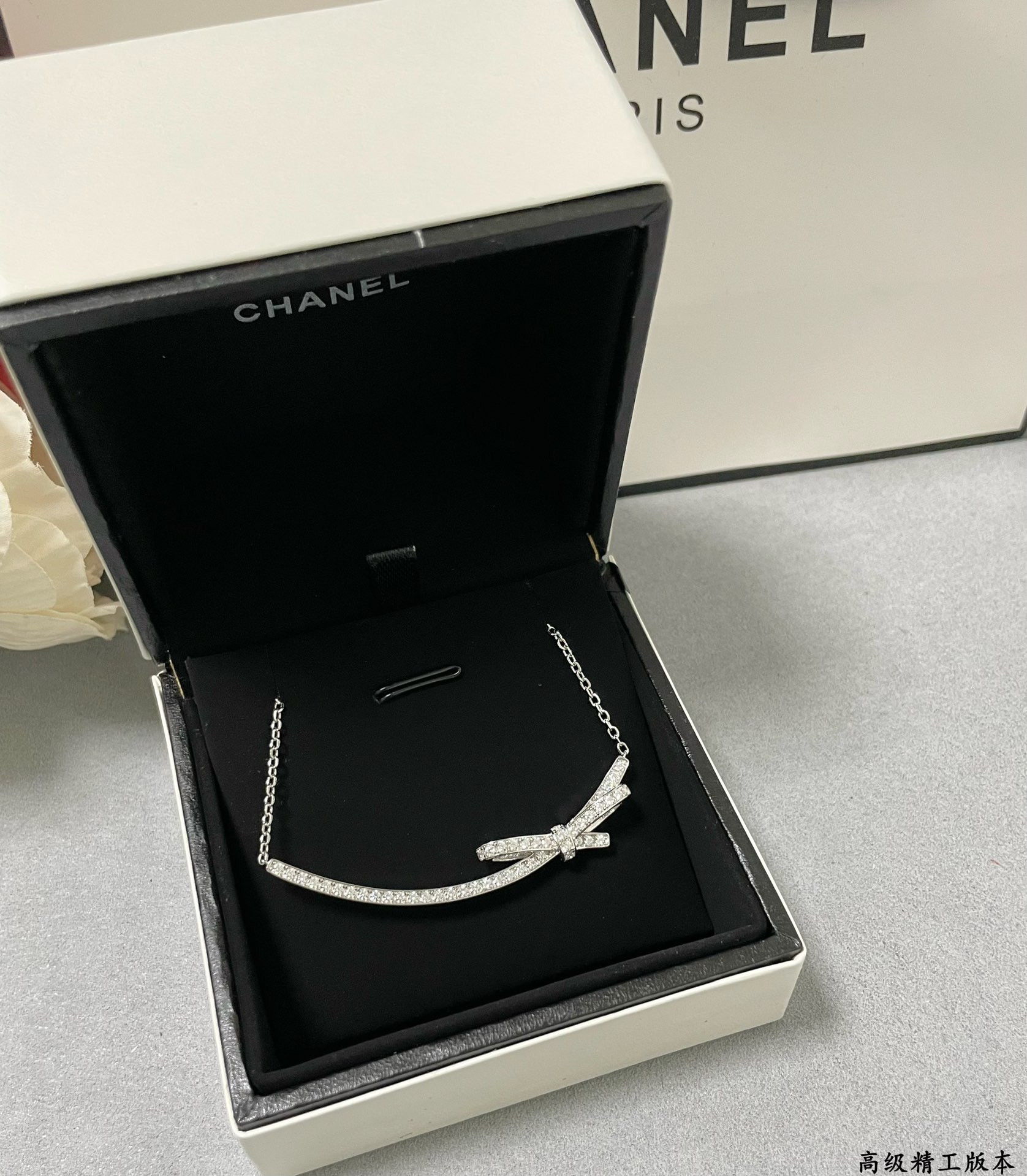 Ch*el bow tie necklace