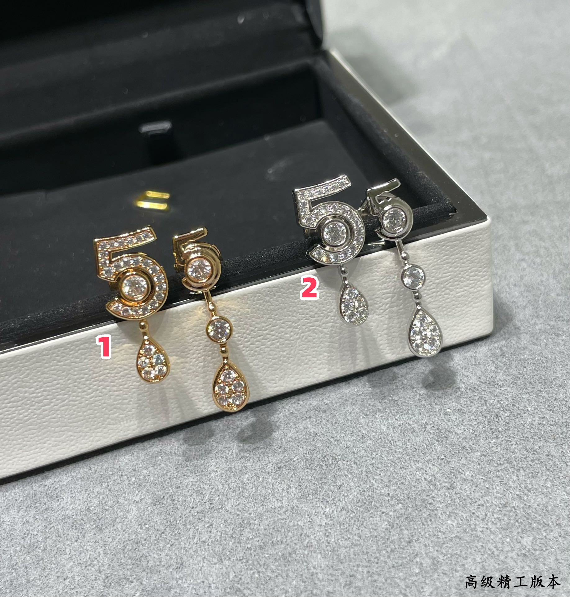 Ch*el 5-word earrings