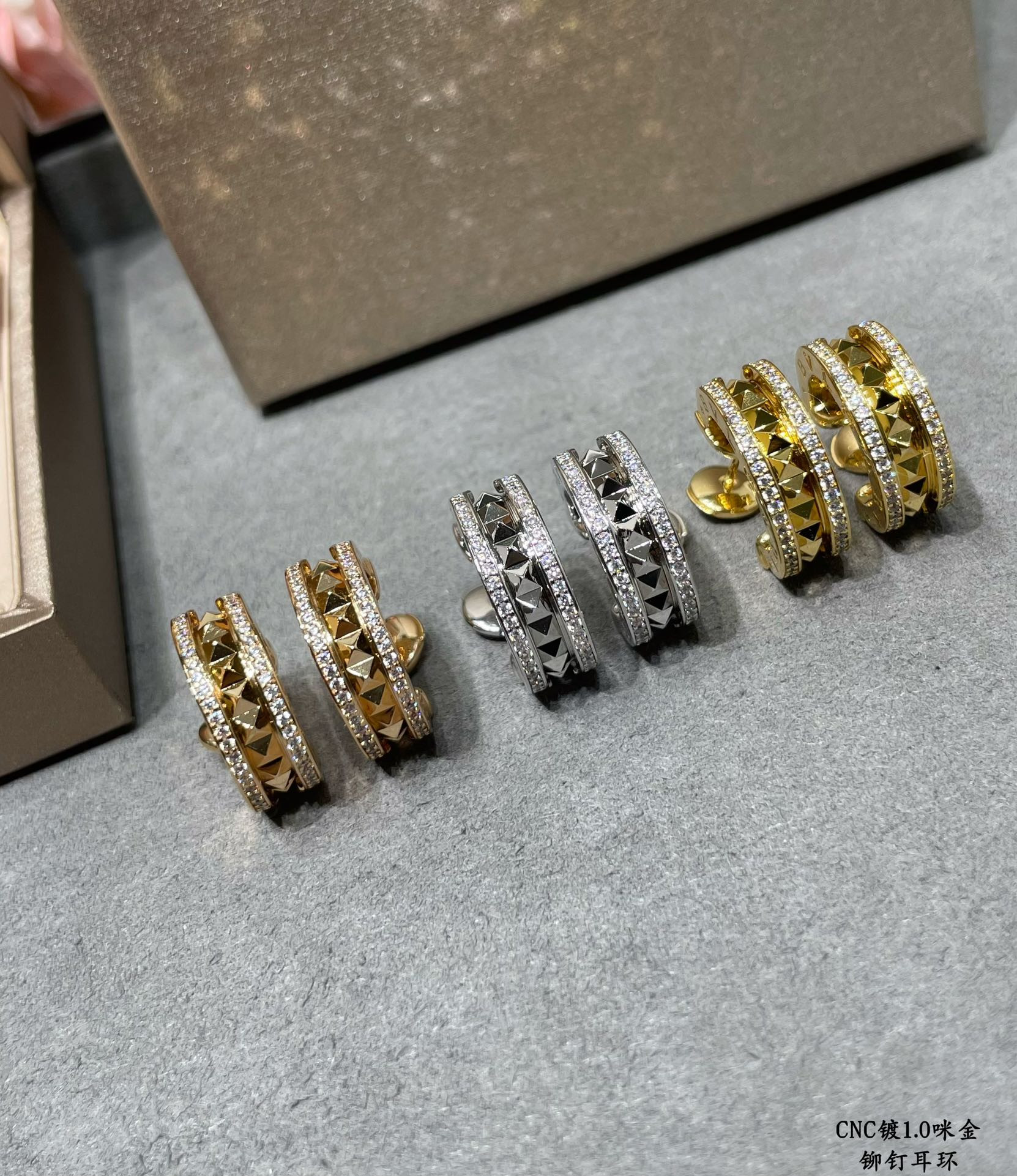 B*l*ai drill rivets on both sides earrings
