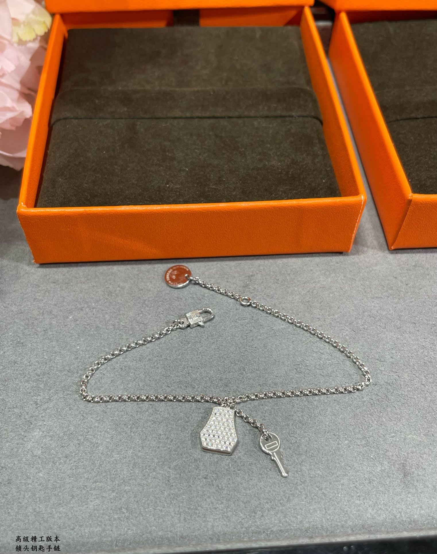 H**mes padlock and key bracelet