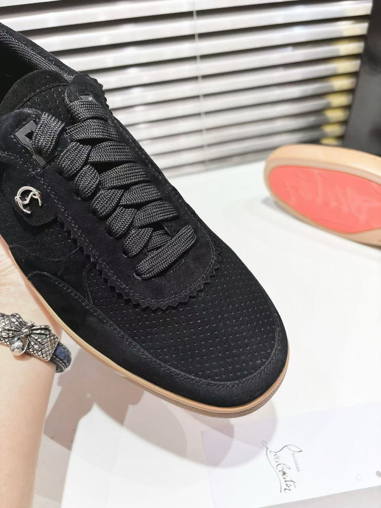 ua Ch**an louboutin sneaker