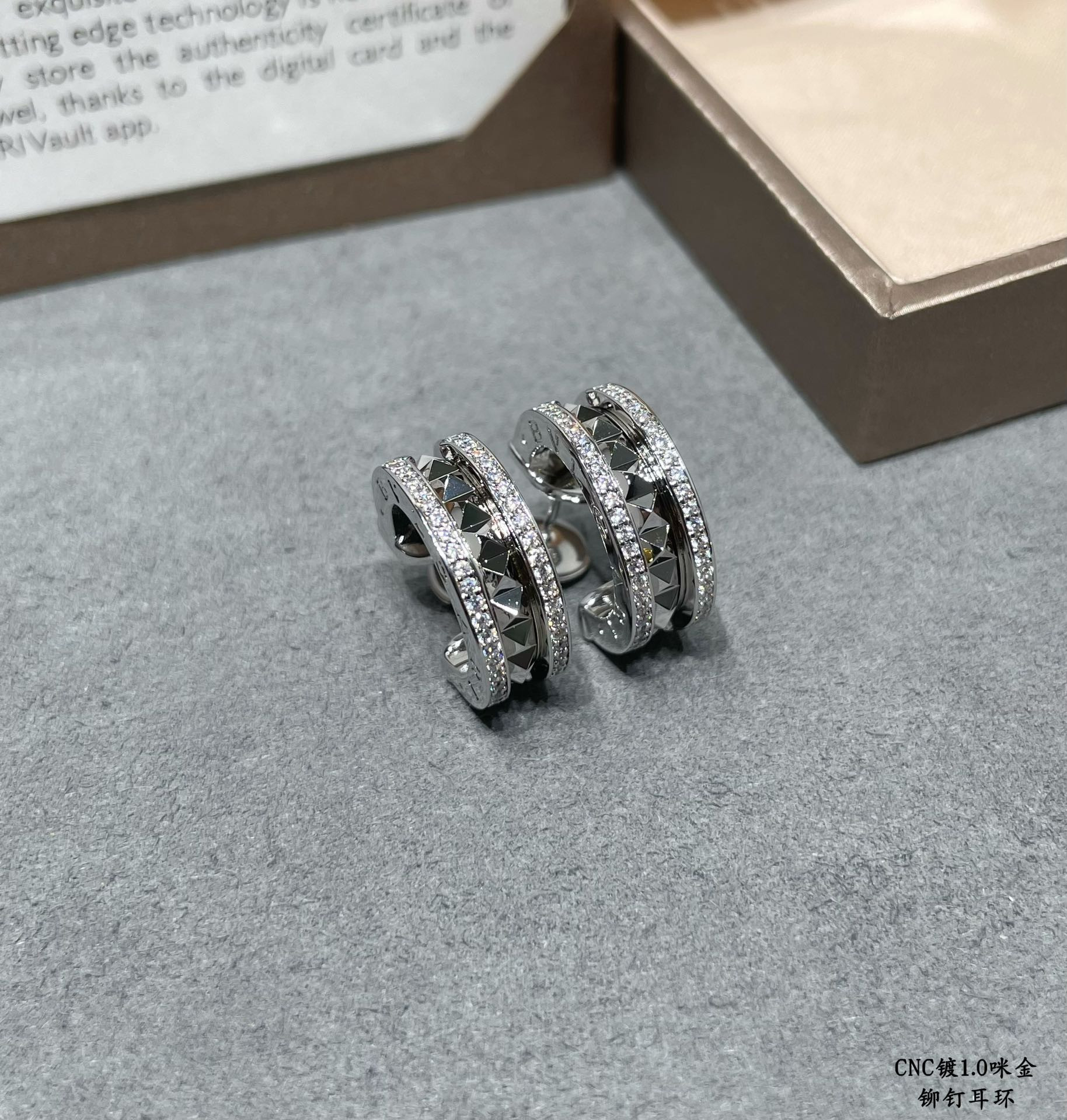 B*l*ai drill rivets on both sides earrings
