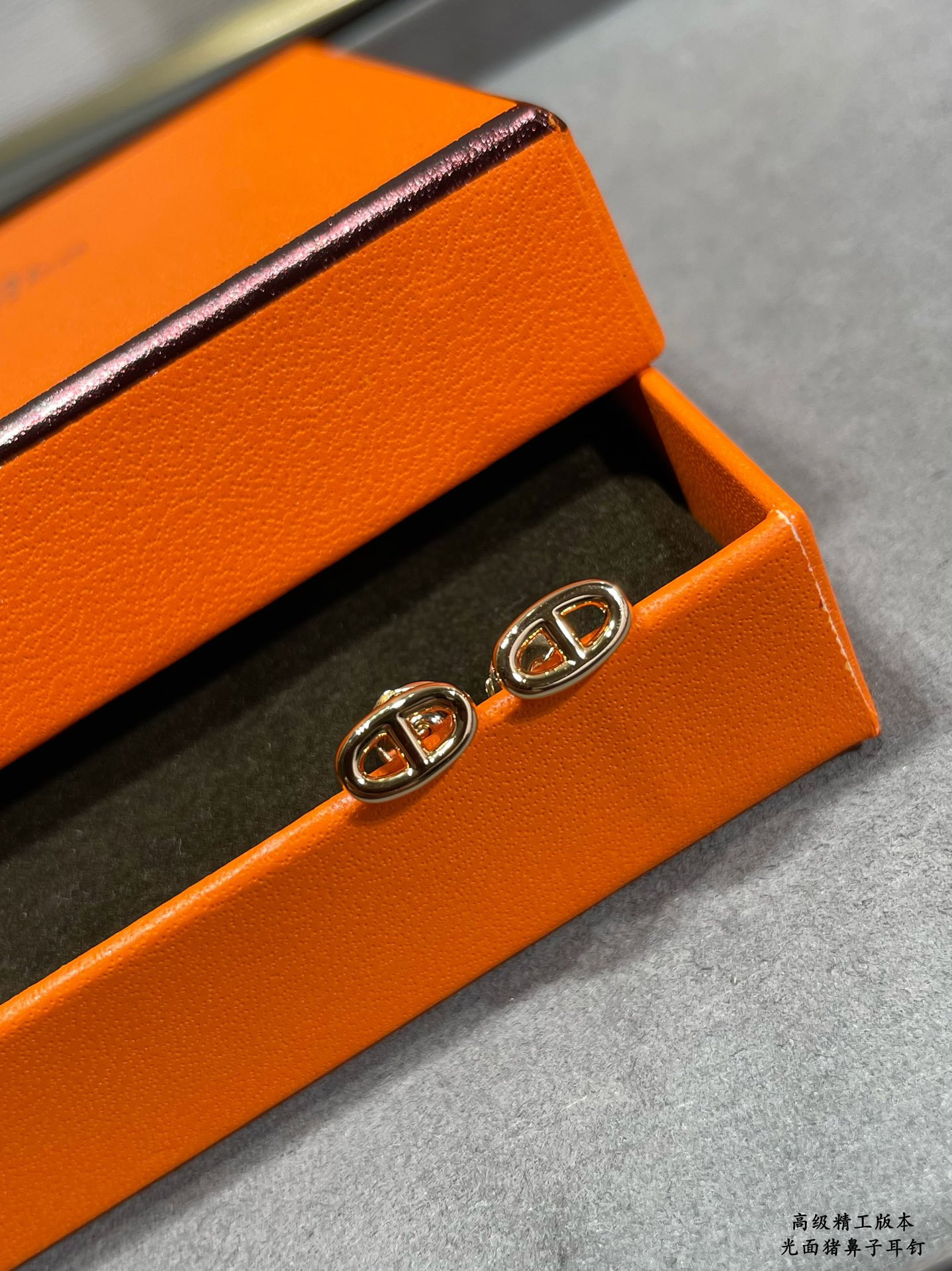 H**mes pig nose stud earrings