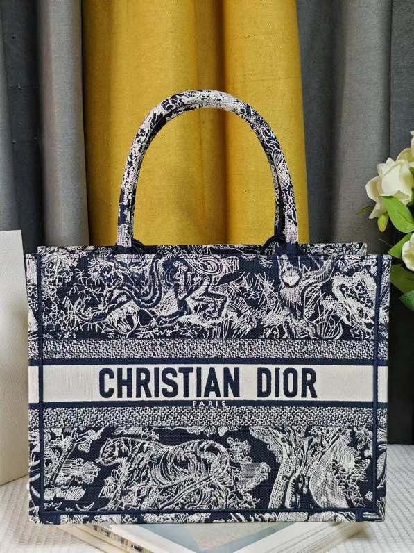 large D*or book tote blue and ecru toile de jouy reverse embroidery 16.5 x 14 x 7.5 inches