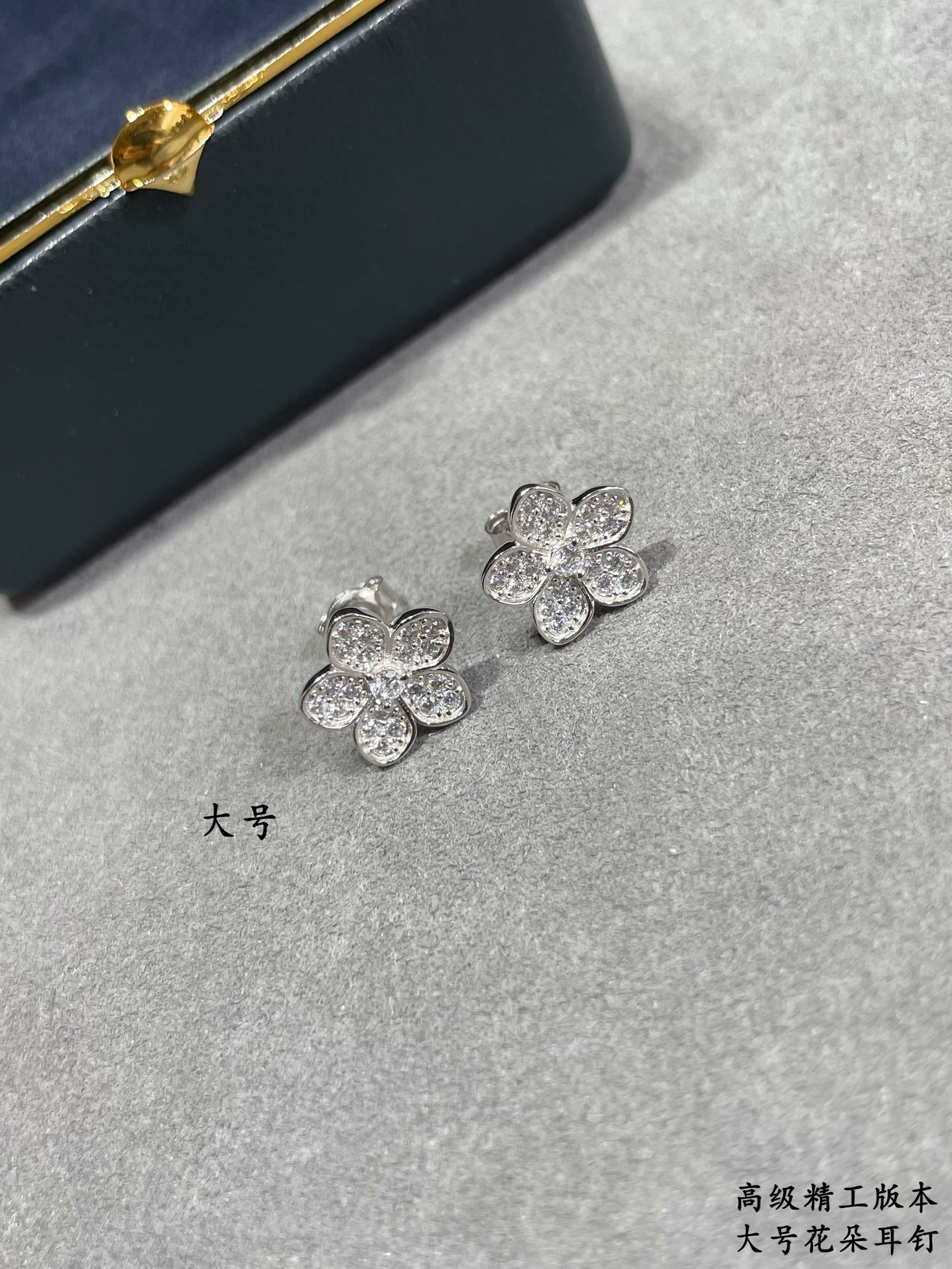 Gr*ff large flowers earrings