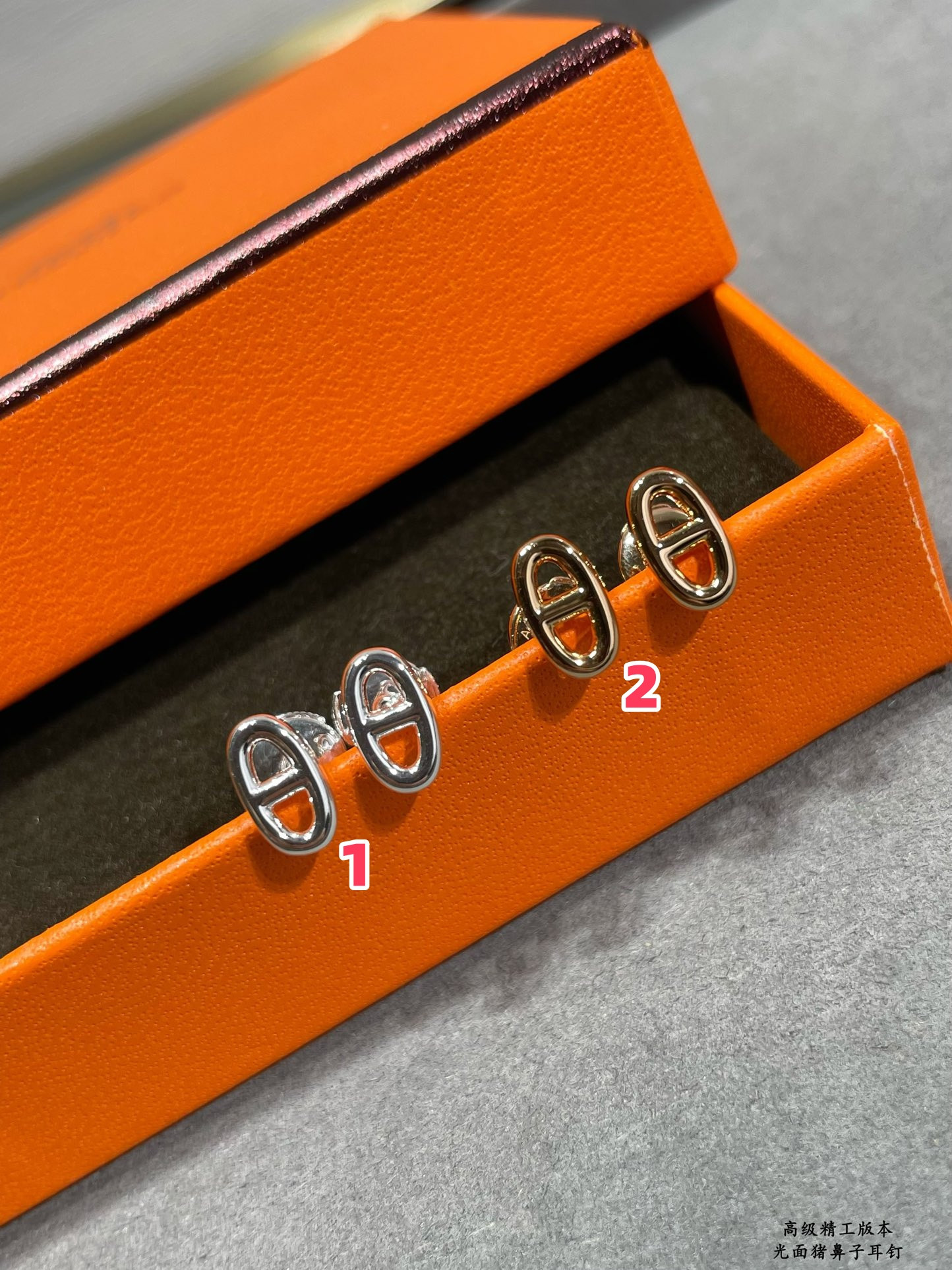 H**mes pig nose stud earrings