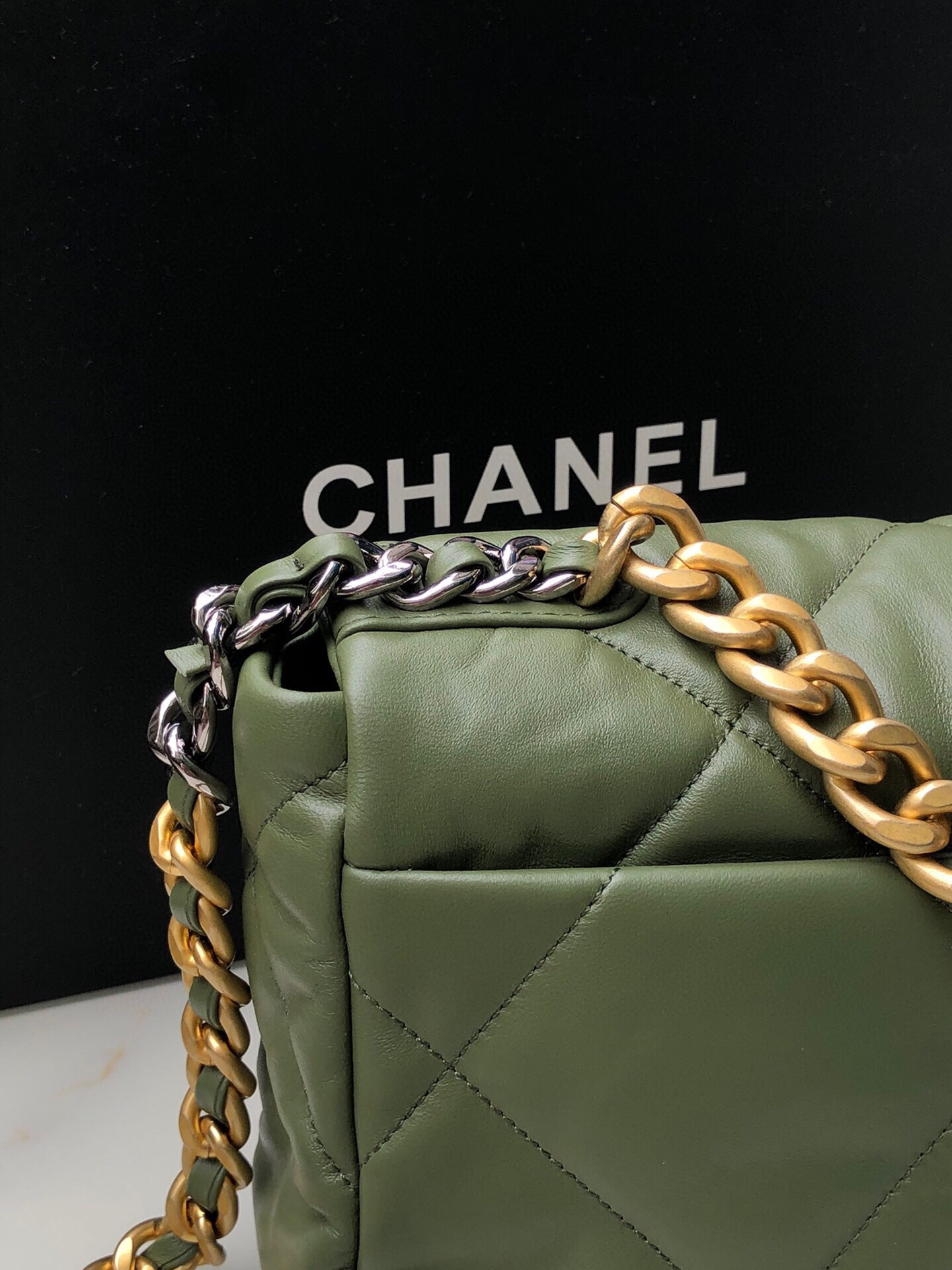 Ch*el 19 handbag shiny leather, gold-tone 16×26×9cm