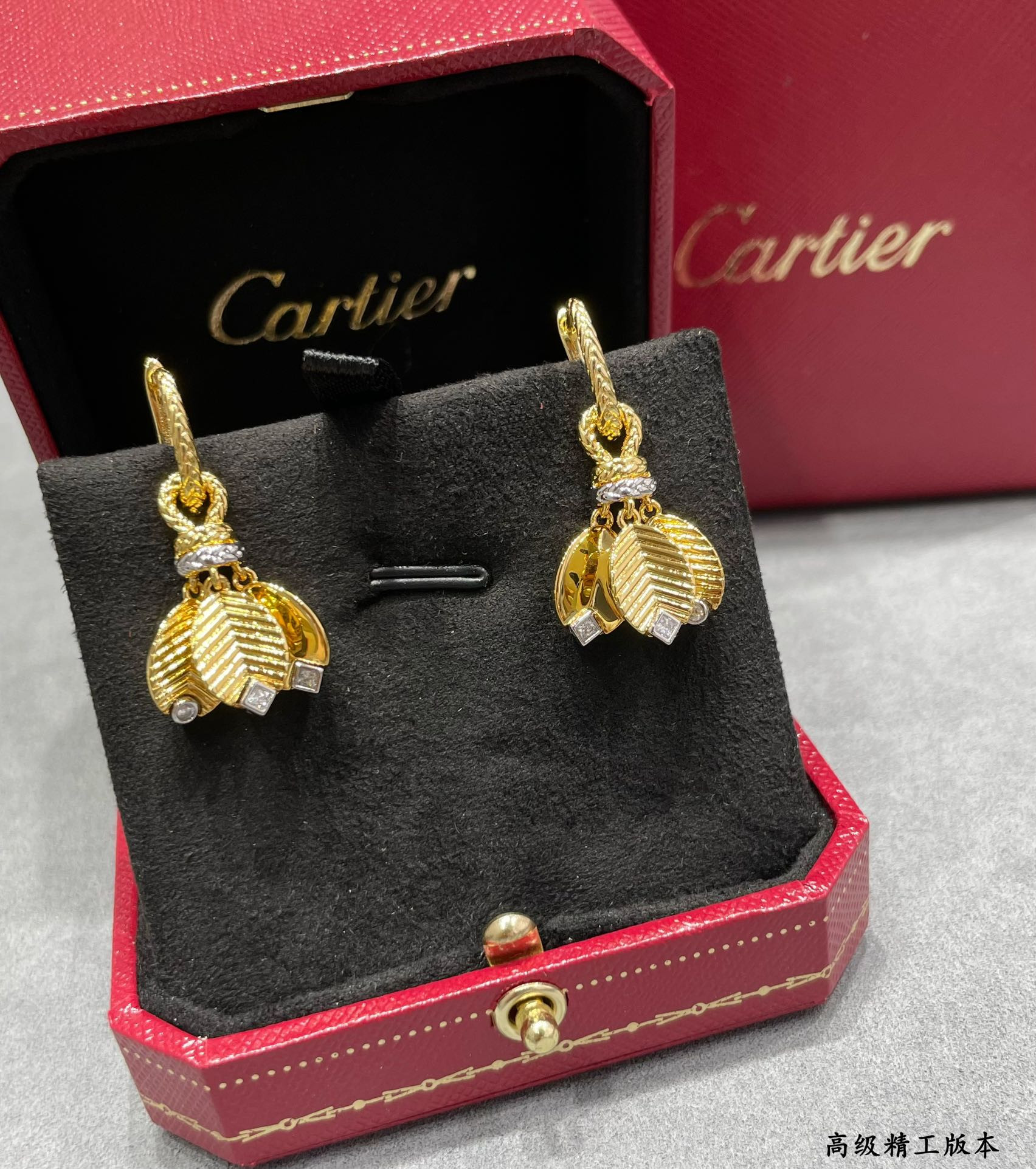 Ca*t*er coffee bean leaf earrings