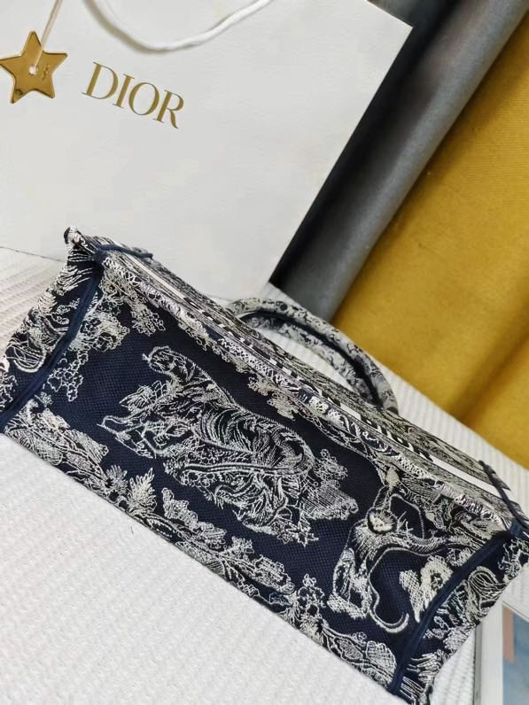 large D*or book tote blue and ecru toile de jouy reverse embroidery 16.5 x 14 x 7.5 inches