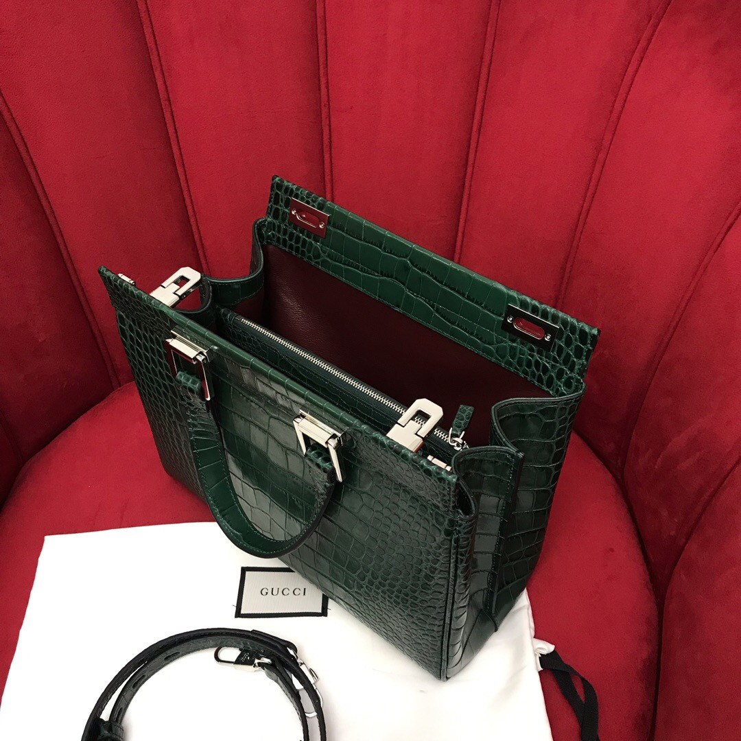 G*u*i zumi leather medium top handle bag