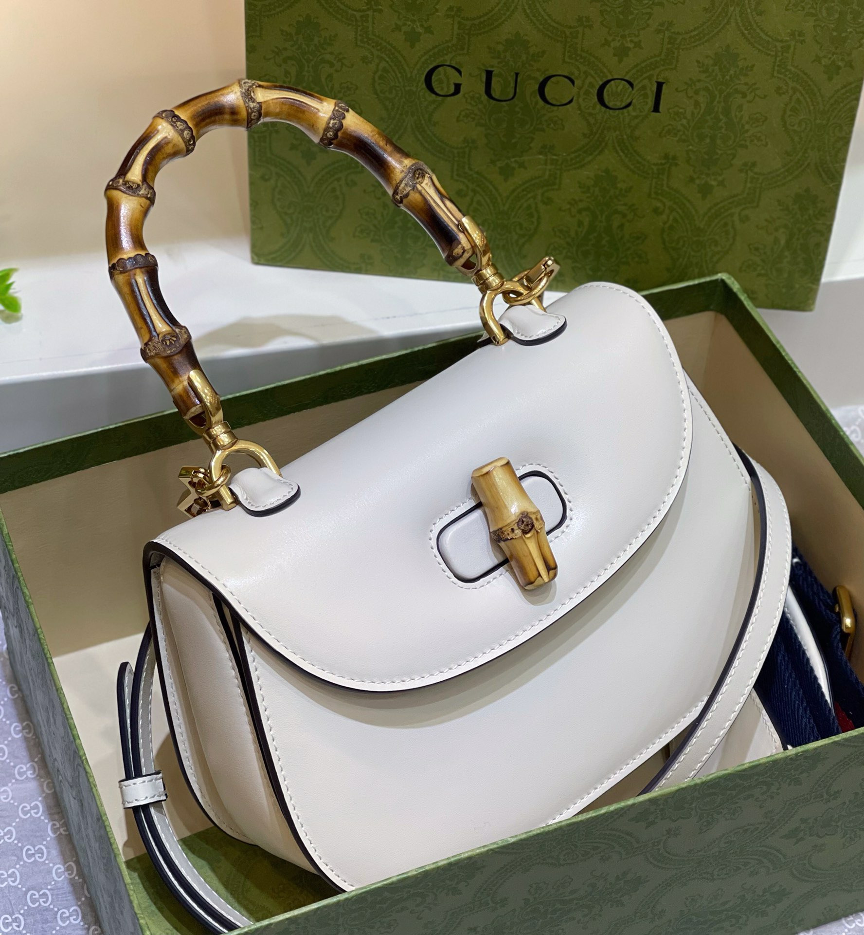 G*u*i small bamboo tote