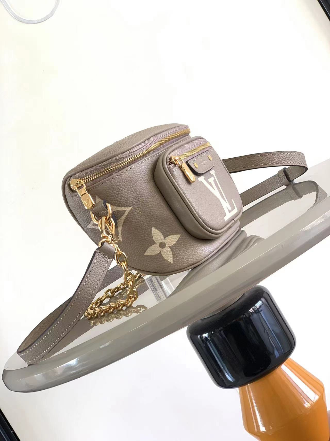 LV Mini Bumbag M83219 6.7 x 4.7 x 3.7 inches