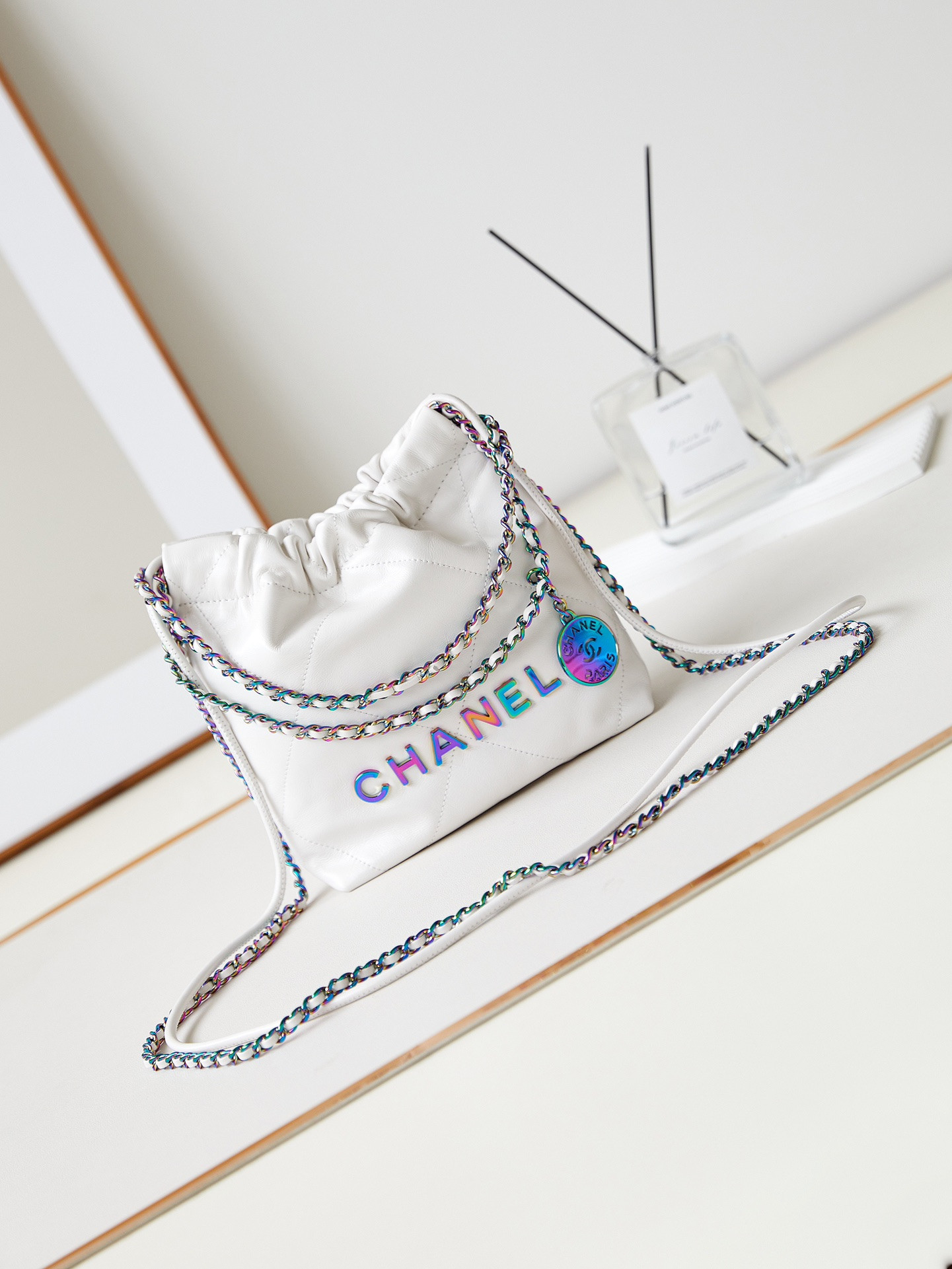 Ch*el 22 mini handbag shiny calfskin & rainbow metal white 7.8 × 7.4 × 2.3 in