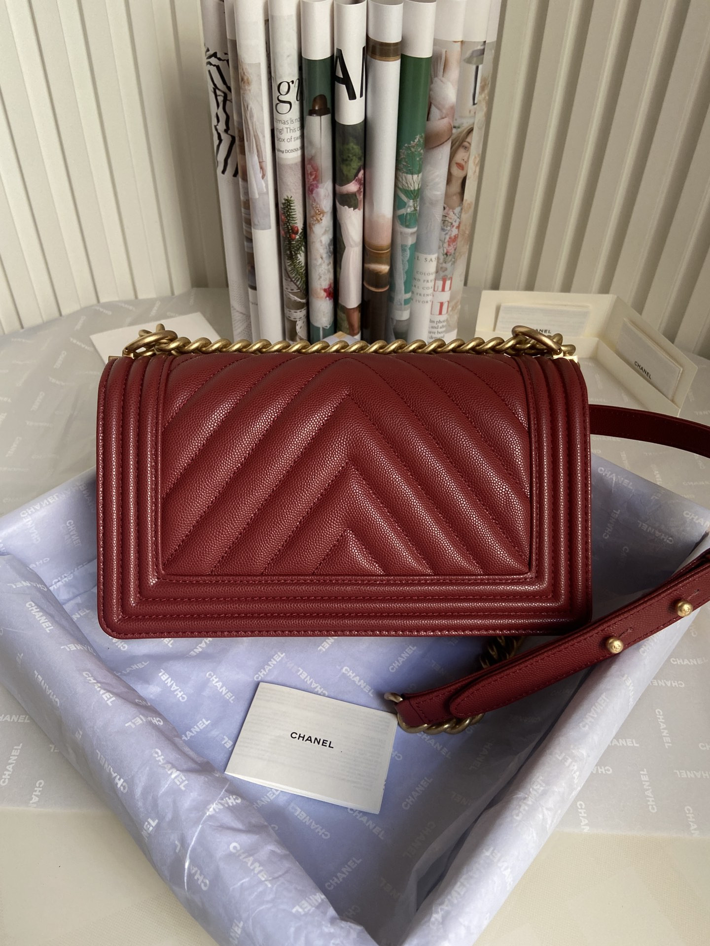 boy Ch*el handbag shiny grained calfskin & gold-tone metal red 5.9 × 9.8 × 3.5 in