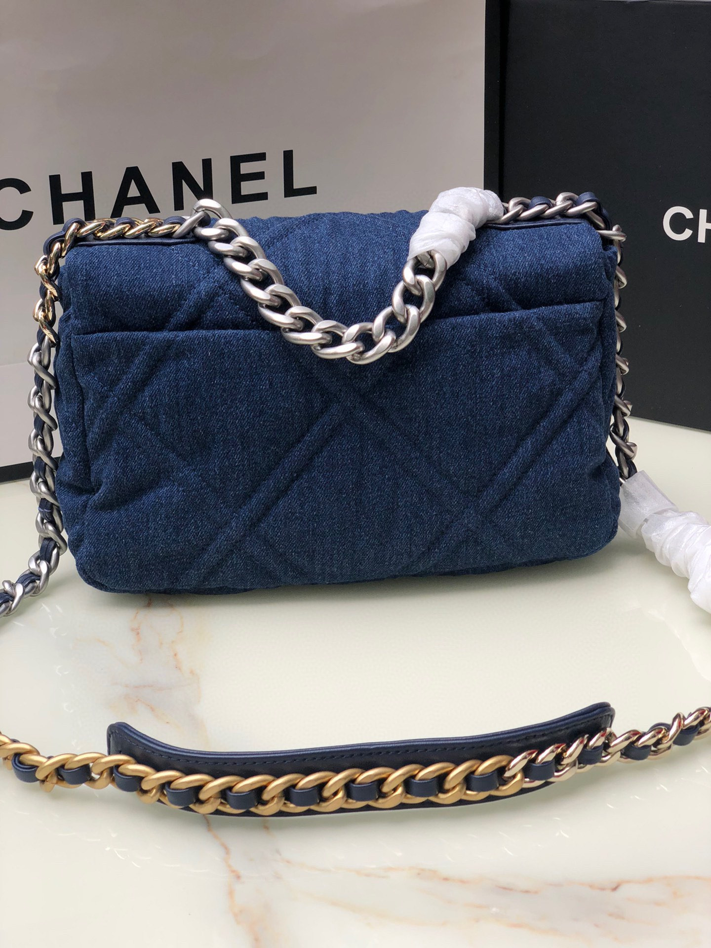 Ch*el 19 handbag, gold-tone, silver-tone & ruthenium-finish metal navy 6.2 × 10.1 × 3.5 in