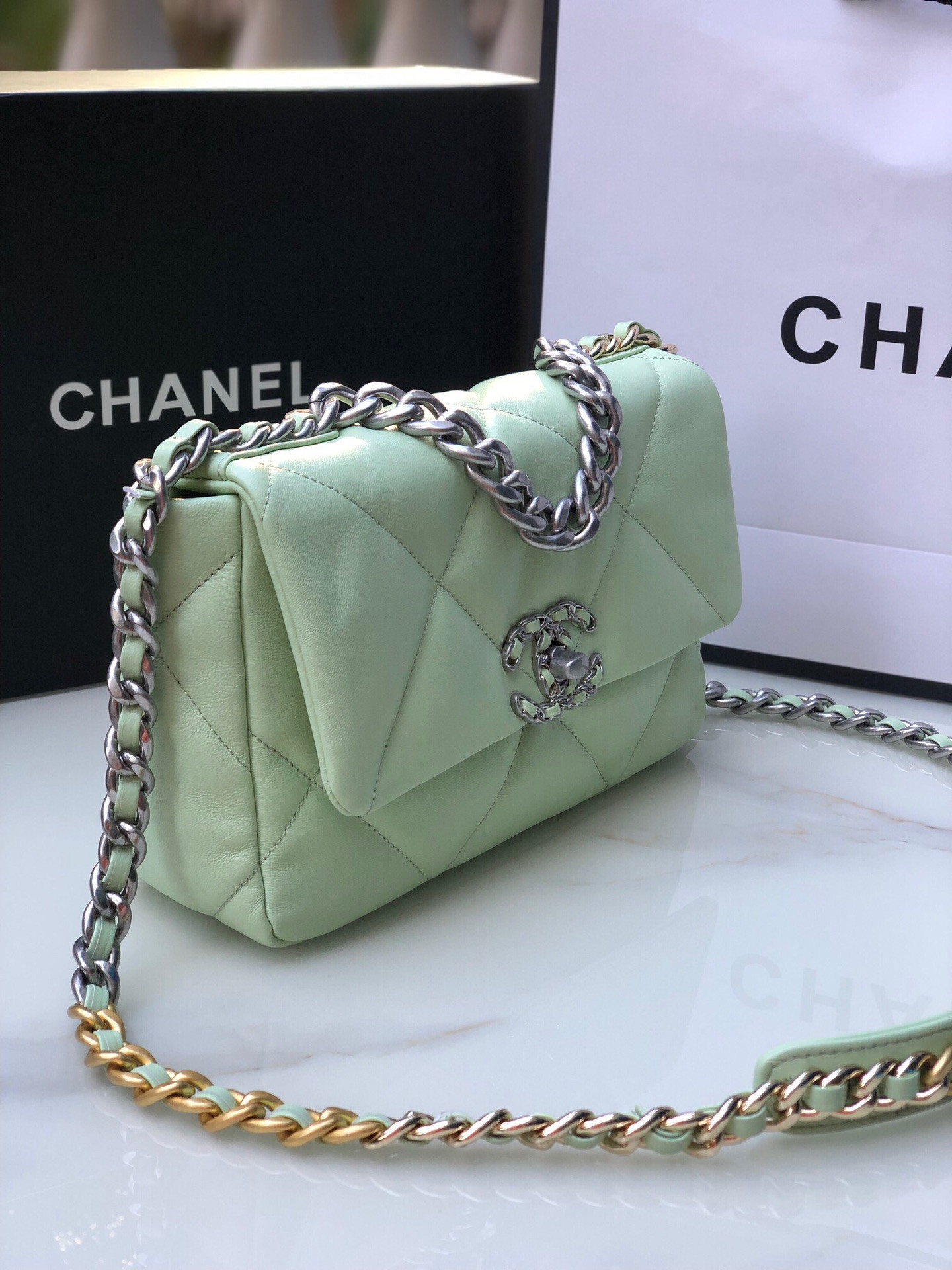 Ch*el 19 handbag shiny leather, gold-tone, silver-tone & ruthenium-finish metal green 6.2 × 10.1 × 3.5 in