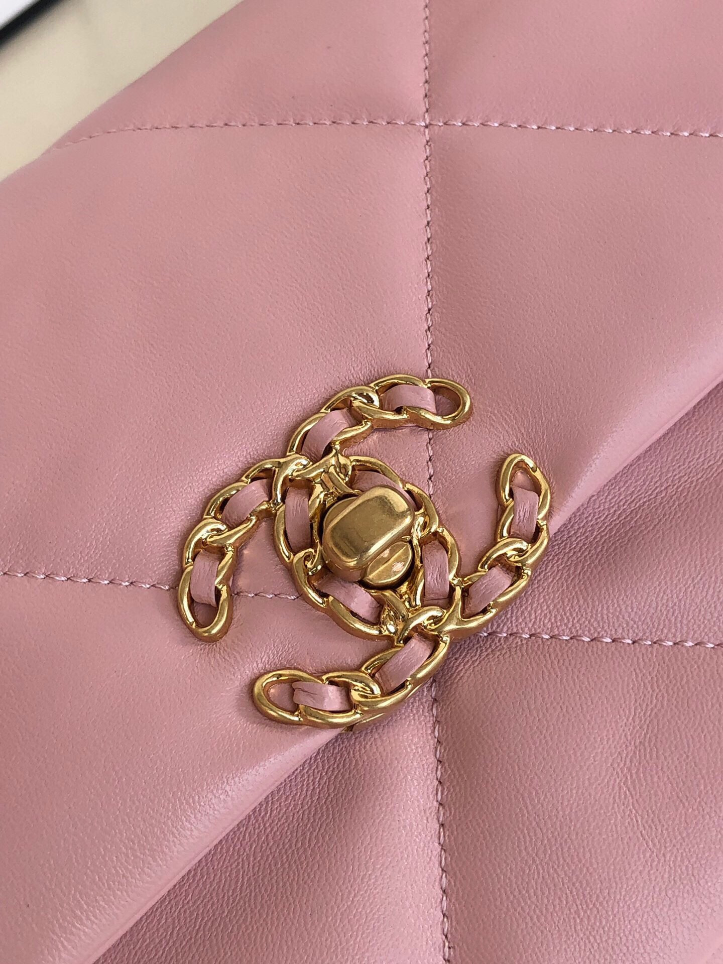 Ch*el 19 handbag shiny leather, gold-tone, silver-tone & ruthenium-finish metal light pink 6.2 × 10.1 × 3.5 in