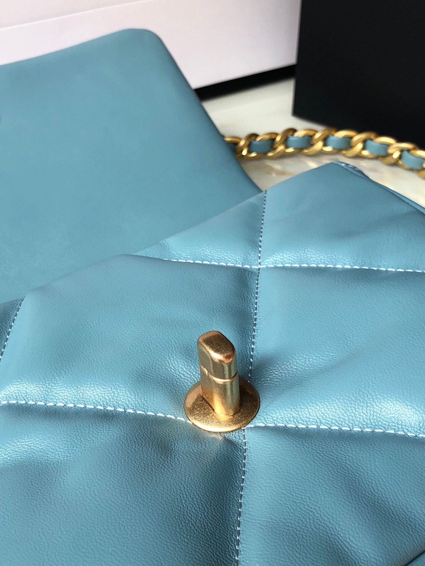 Ch*el 19 handbag shiny leather, gold-tone, silver-tone & ruthenium-finish metal blue 6.2 × 10.1 × 3.5 in