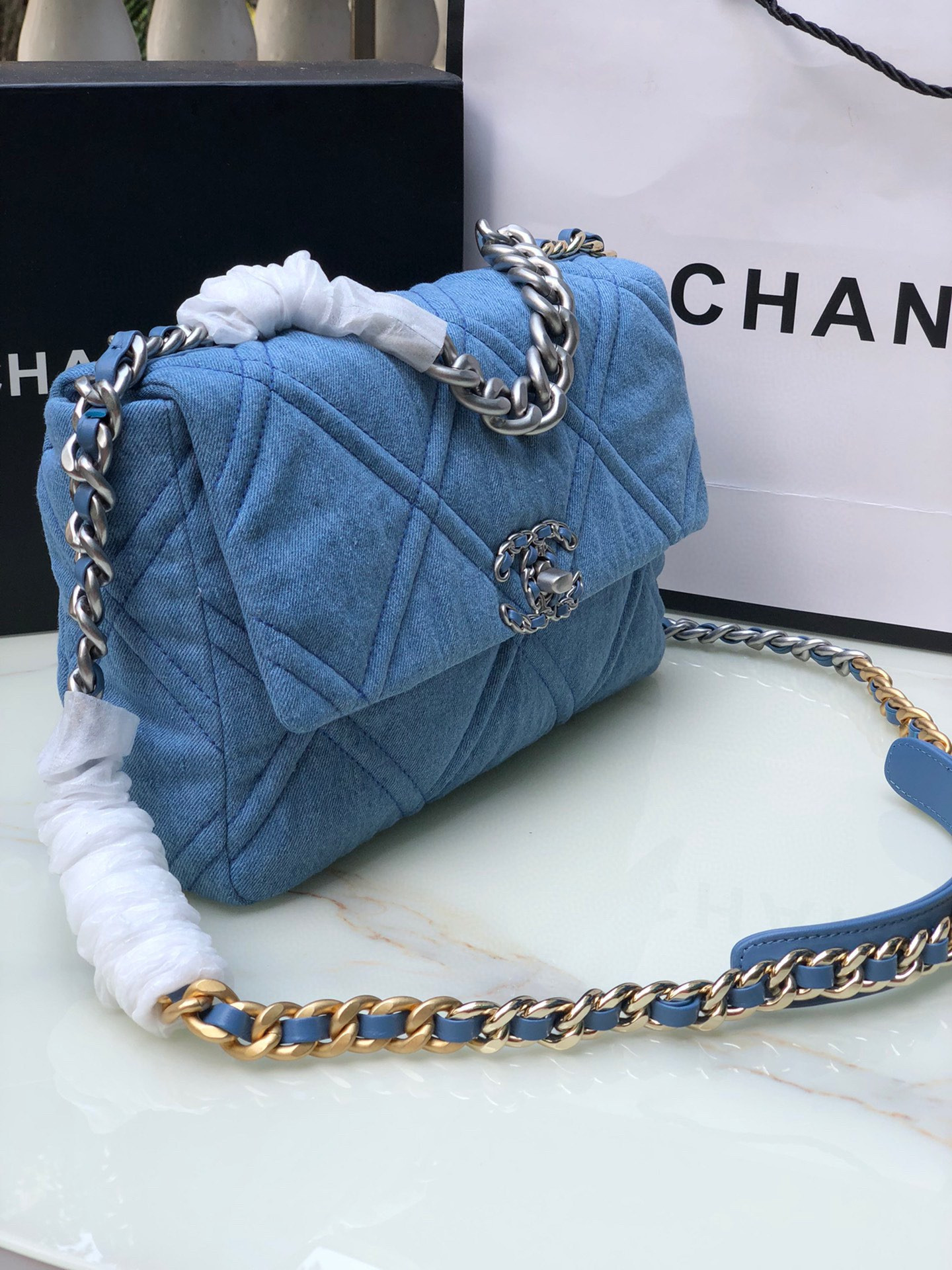 Ch*el 19 large handbag, gold-tone, silver-tone & ruthenium-finish metal blue 7.8 × 11.7 × 3.9 in