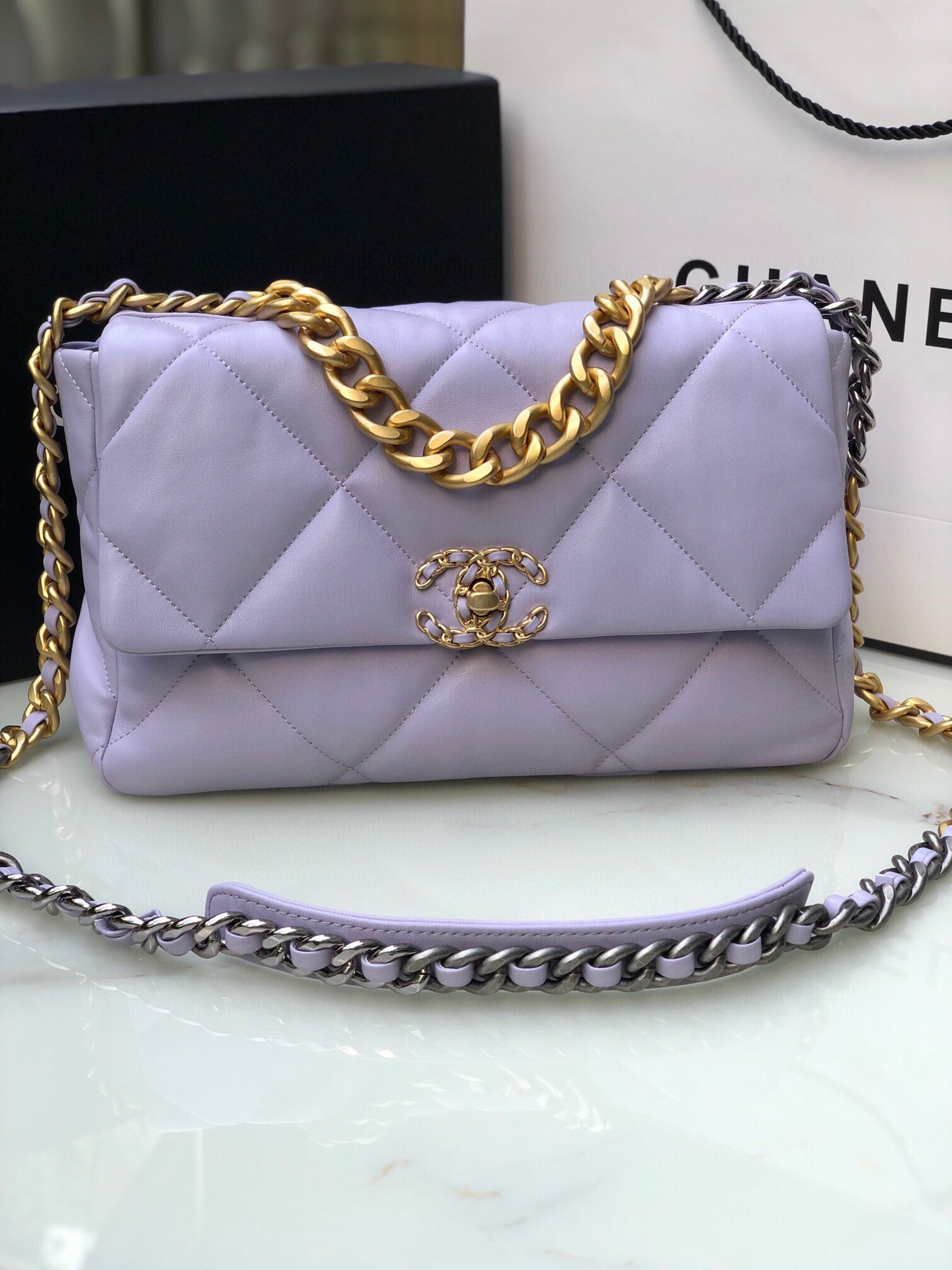 Ch*el 19 large handbag shiny leather, gold-tone, silver-tone & ruthenium-finish metal purple 7.8 × 11.7 × 3.9 in