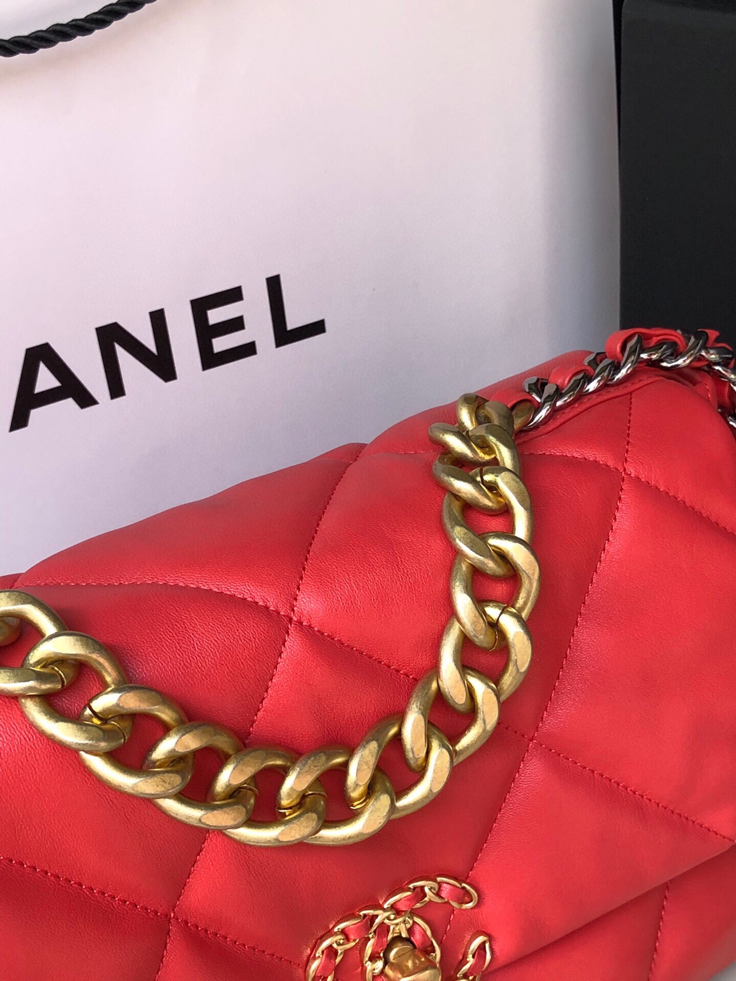 Ch*el 19 large handbag shiny leather red, gold-tone, silver-tone & ruthenium-finish metal 7.8 × 11.7 × 3.9 in