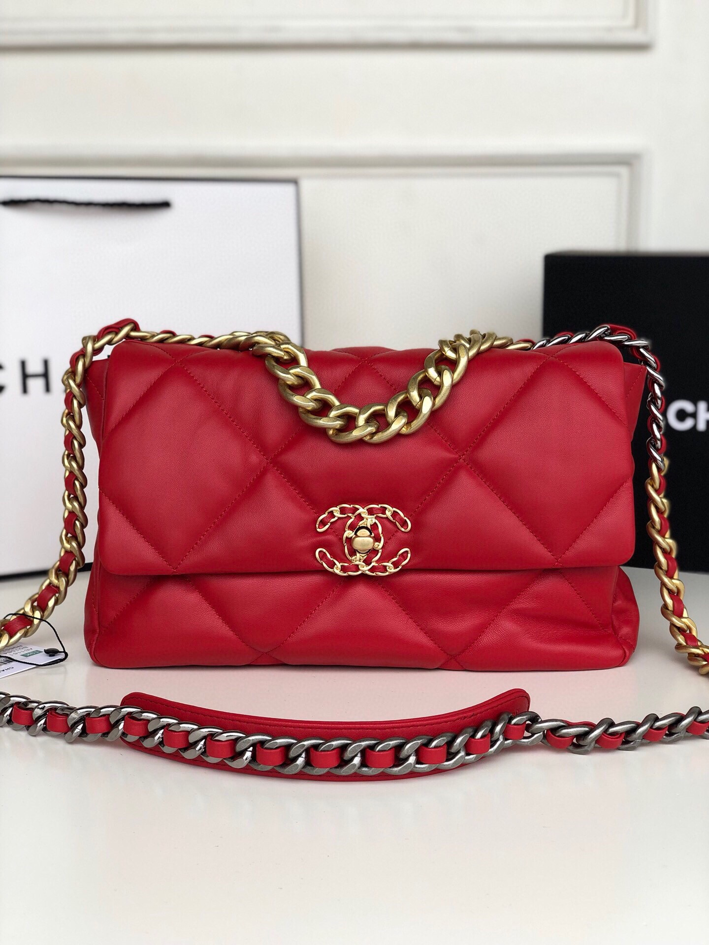 Ch*el 19 large handbag shiny leather, gold-tone, silver-tone & ruthenium-finish metal red 7.8 × 11.7 × 3.9 in