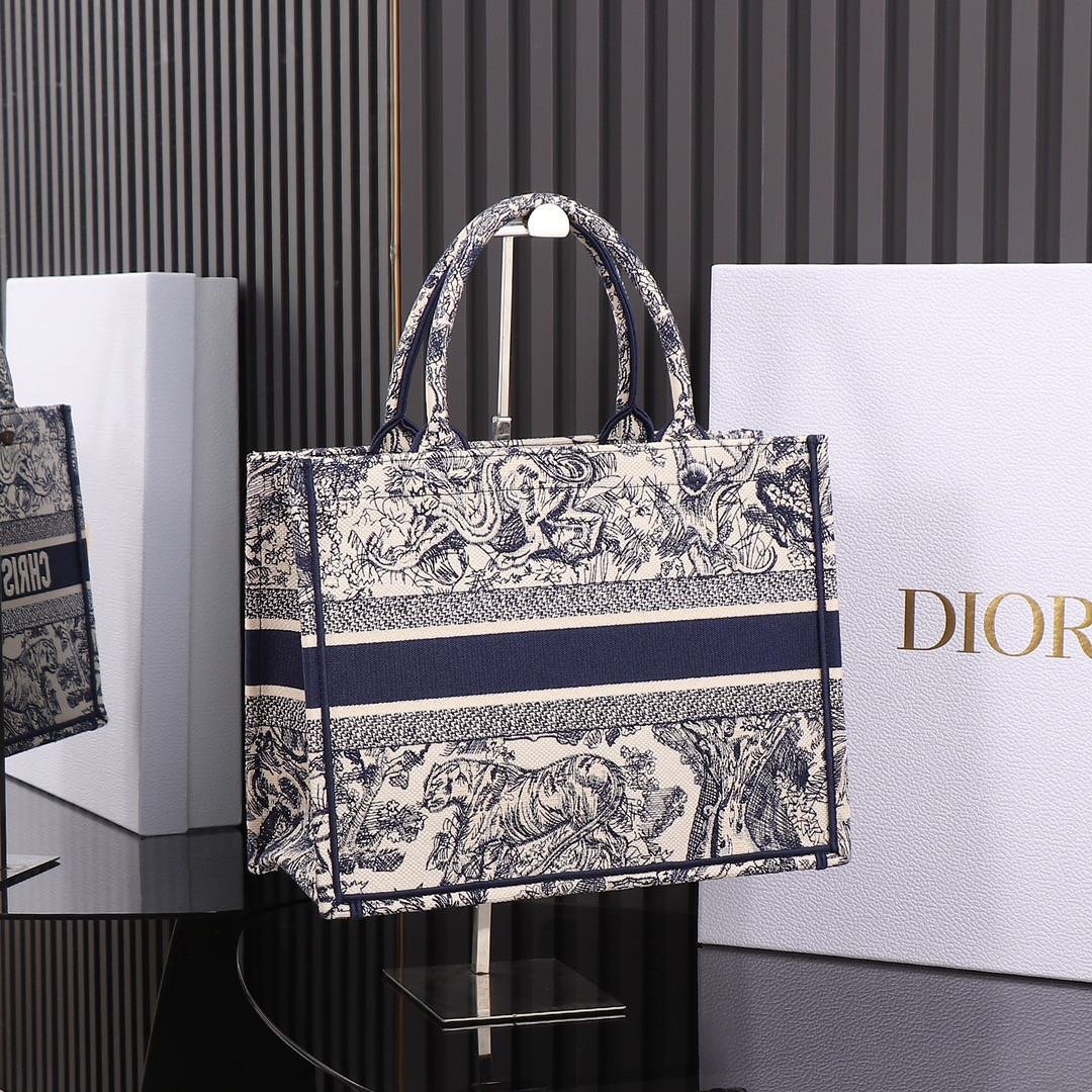 medium D*or book tote ecru and blue toile de jouy embroidery 14 x 11 x 6.5 inches
