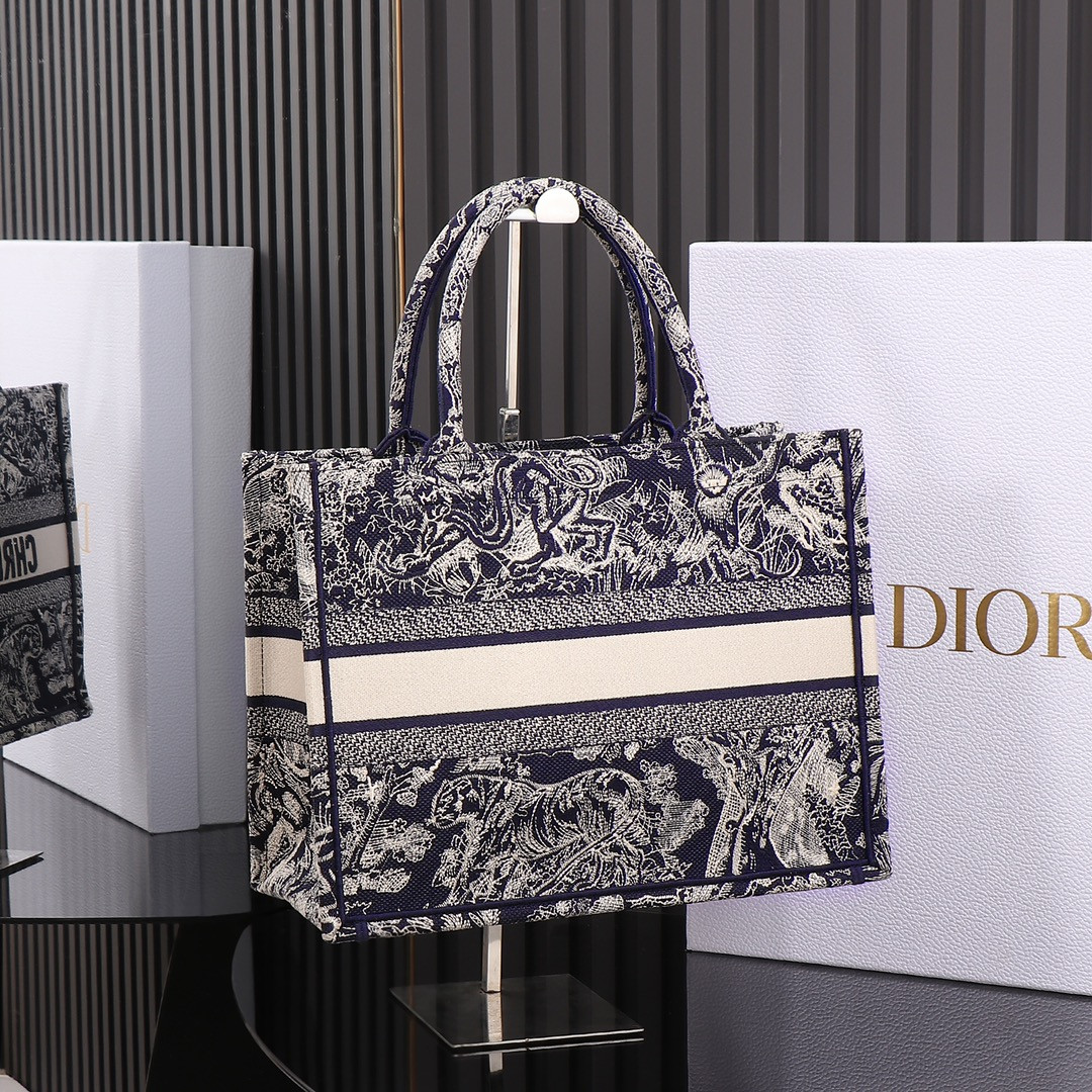 medium D*or book tote blue and ecru toile de jouy reverse embroidery 14 x 11 x 6.5 inches