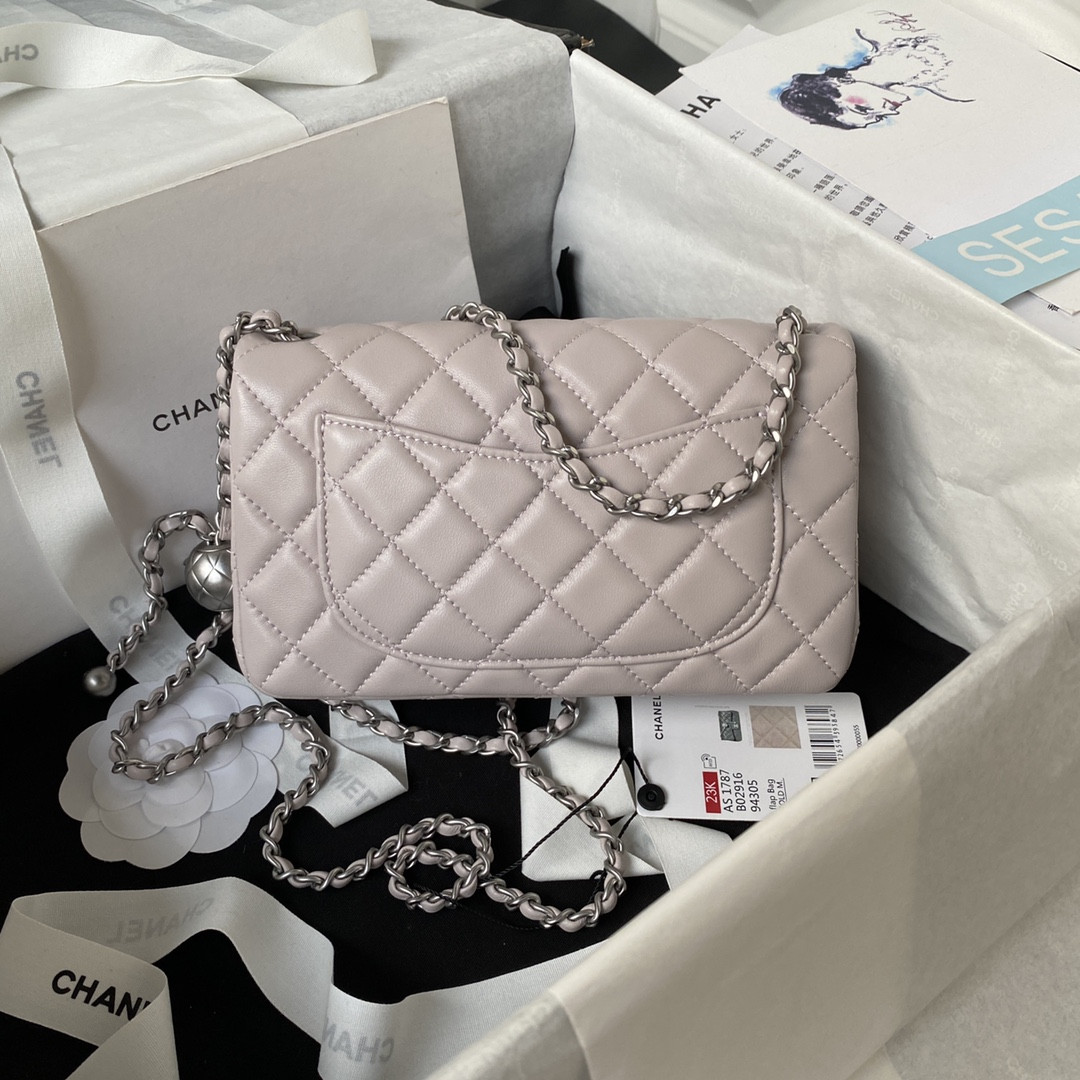Ch*el mini flap bag shiny calfskin & silver-tone metal light pink 4.7 × 7.8 × 2.3 in