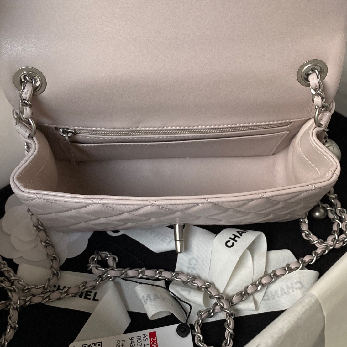 Ch*el mini flap bag shiny calfskin & silver-tone metal light pink 4.7 × 7.8 × 2.3 in