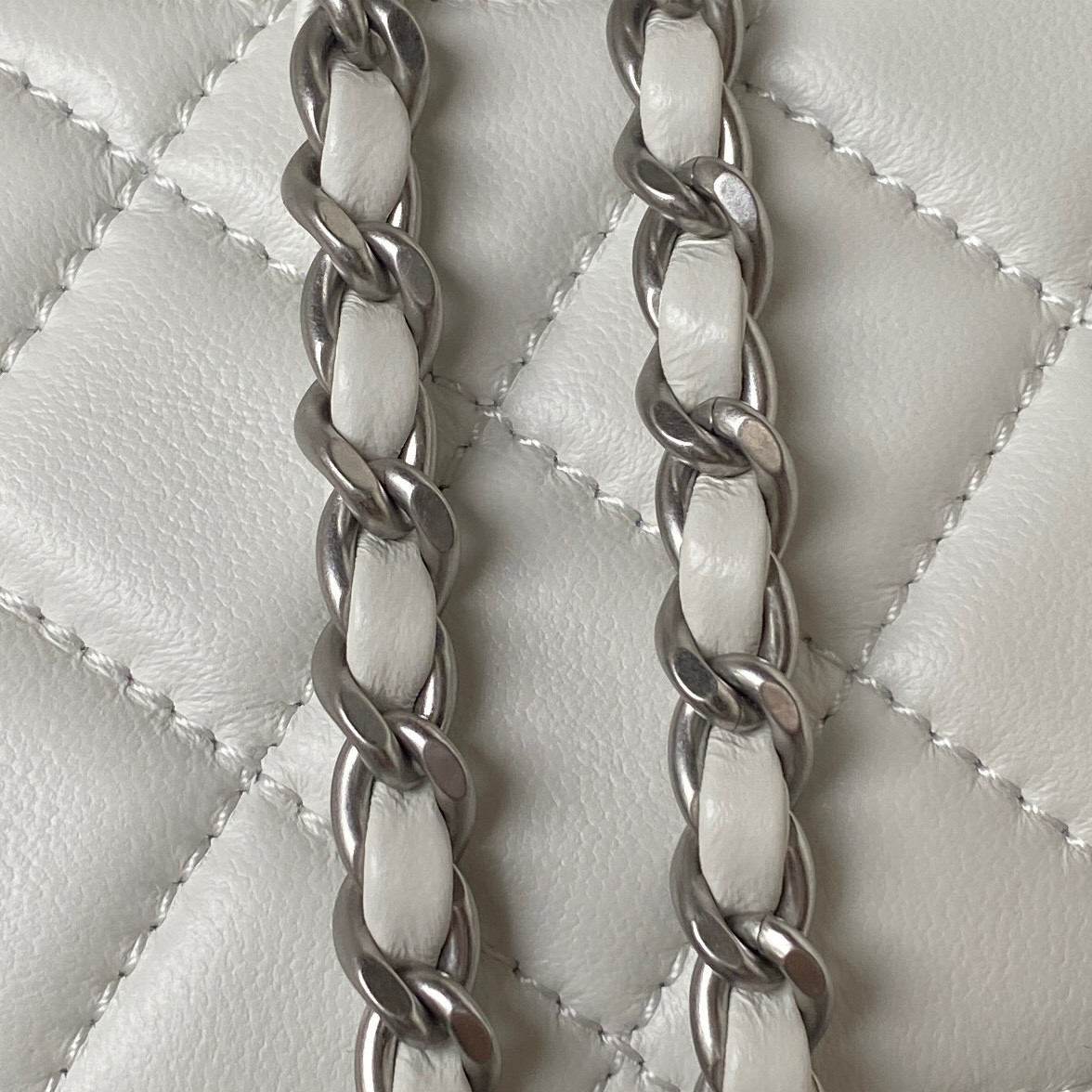 Ch*el mini flap bag shiny calfskin & silver-tone metal white 4.7 × 7.8 × 2.3 in