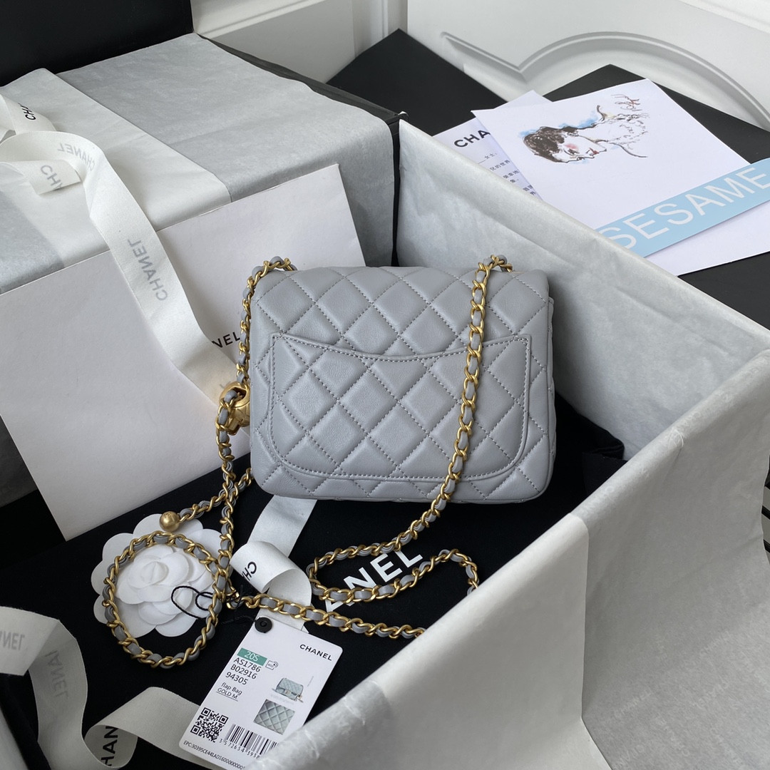 Ch*el mini flap bag shiny calfskin & gold-tone metal light blue 5.3 × 6.6 × 3.1 in