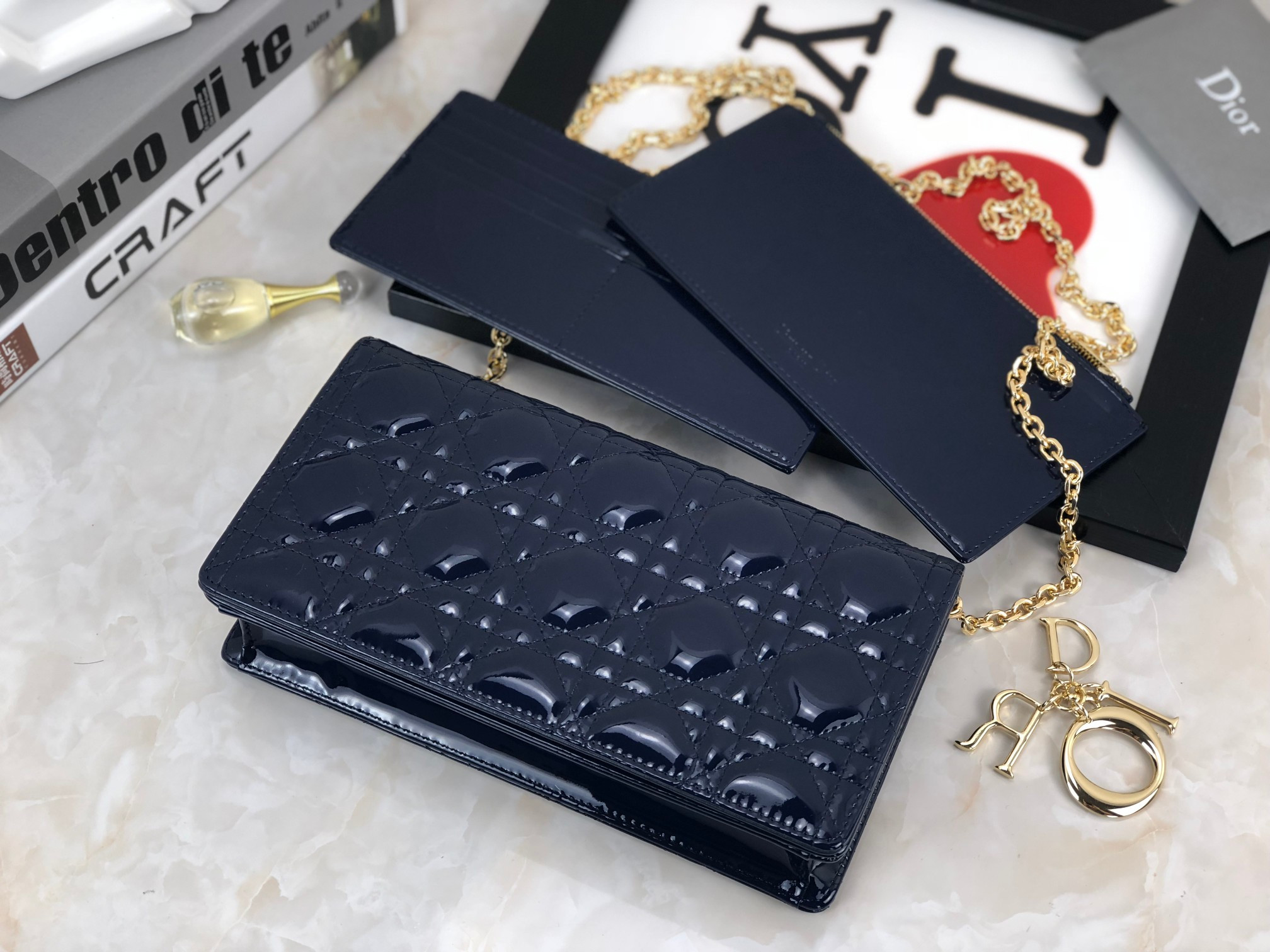 lady D*or pouch navy patent cannage calfskin 8.5 x 4.5 x 1 inches