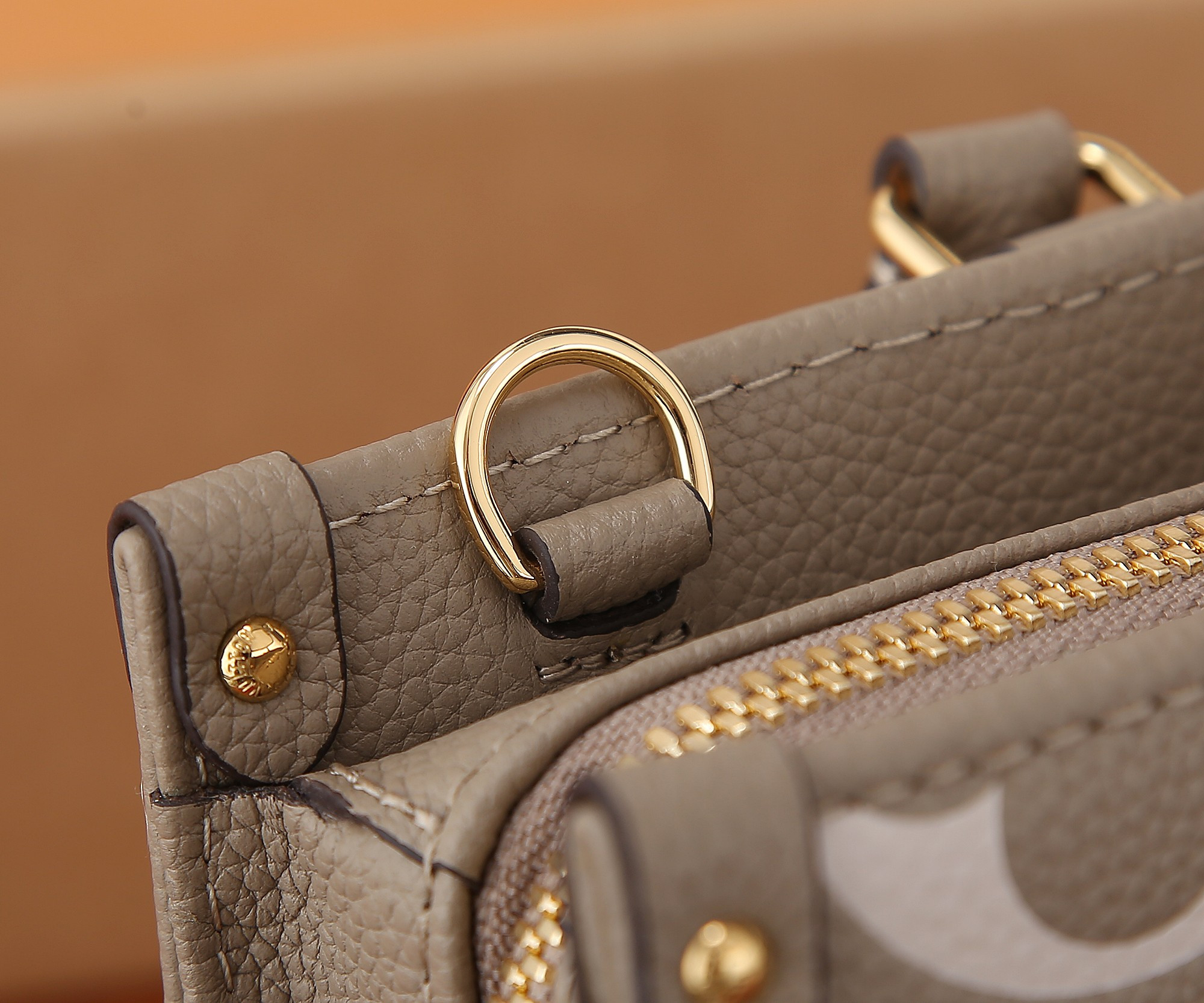LV OnTheGo East West M23641 9.8 x 5.1 x 3.9 inches