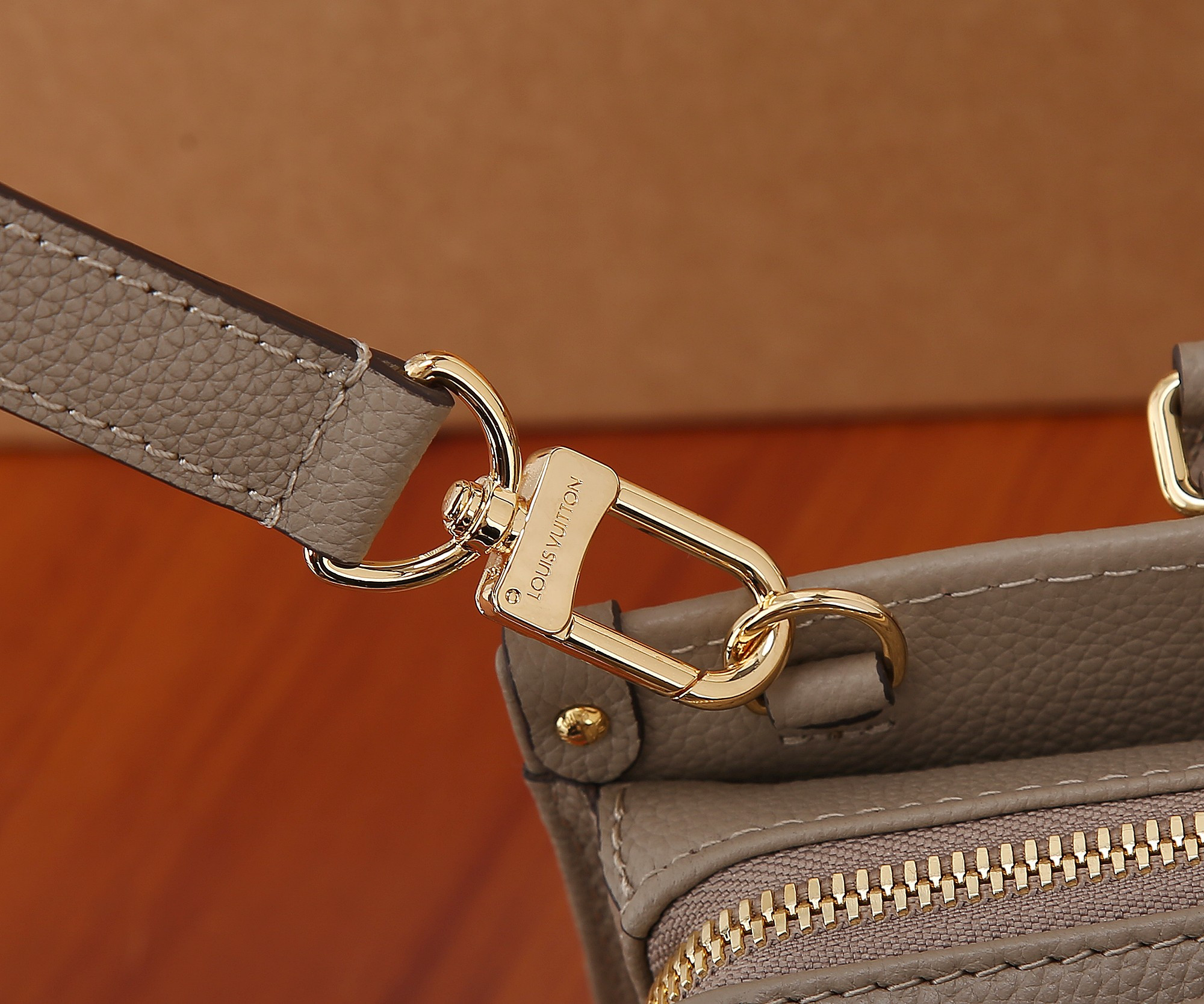 LV OnTheGo East West M23641 9.8 x 5.1 x 3.9 inches