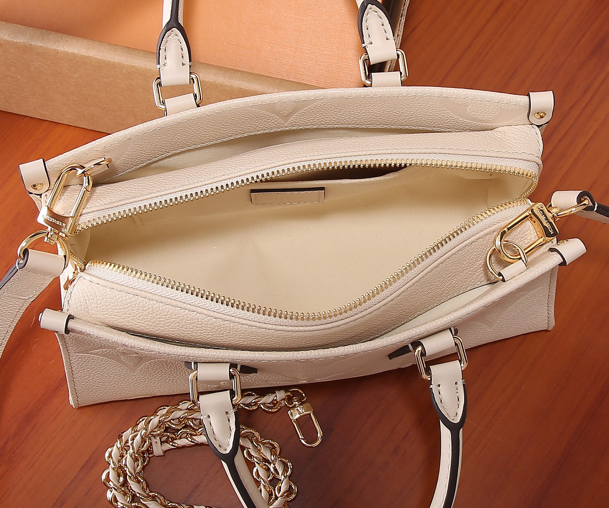 LV OnTheGo East West M23698 9.8 x 5.1 x 3.9 inches