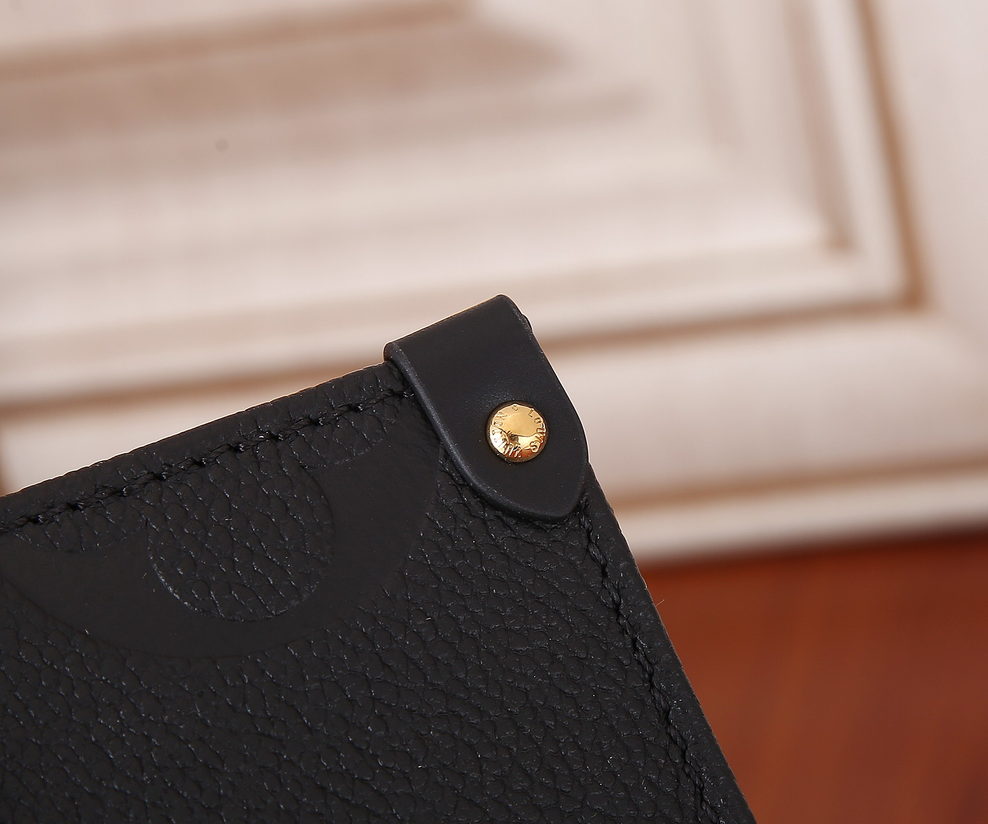 LV OnTheGo East West M23640 9.8 x 5.1 x 3.9 inches