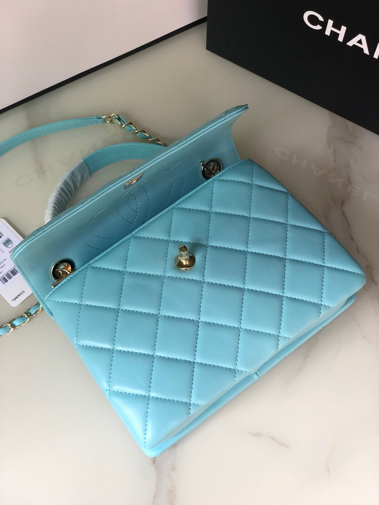 Ch*el flap bag with top handle 6.6 × 9.8 × 4.7 in