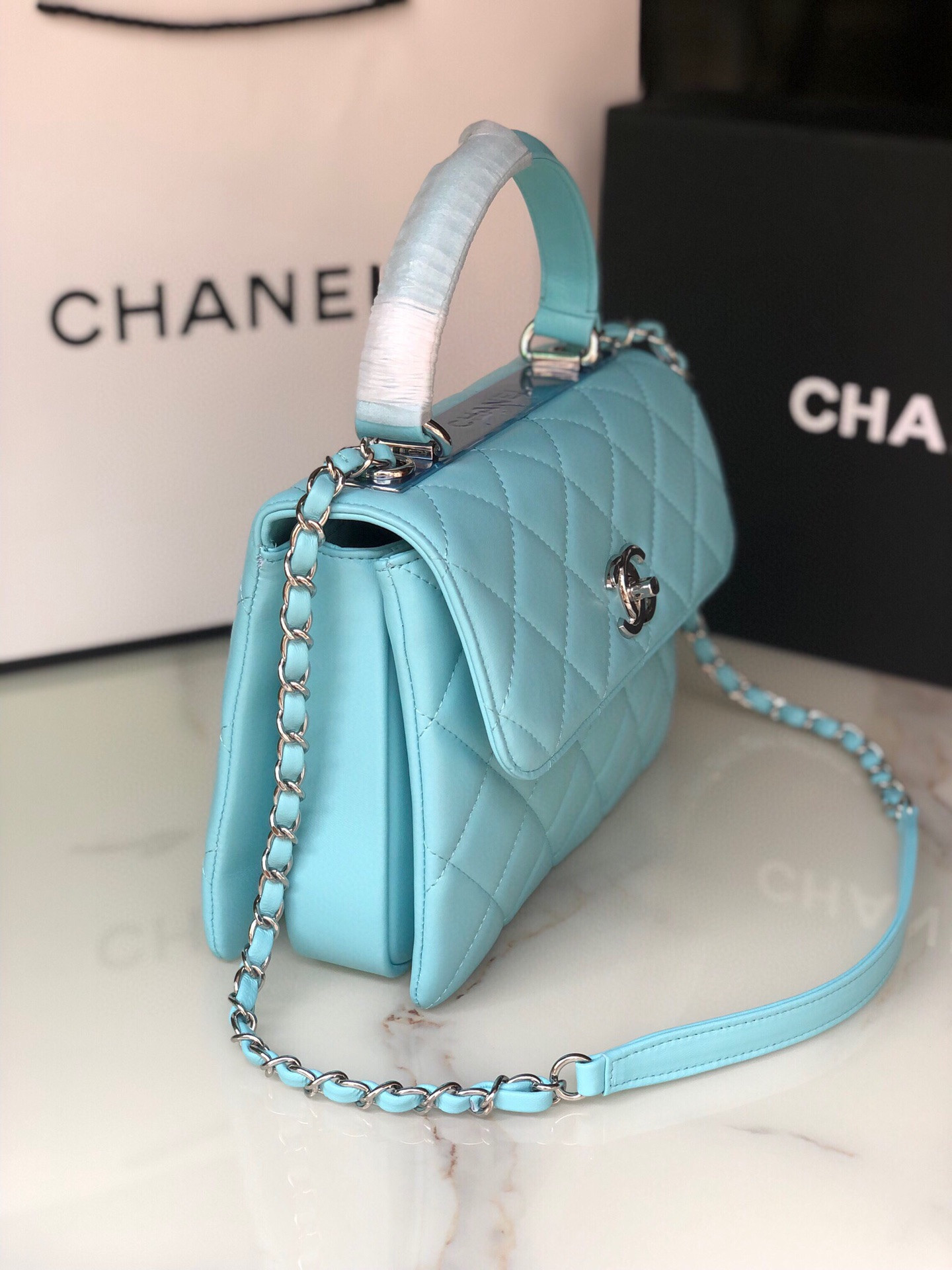 Ch*el flap bag with top handle 6.6 × 9.8 × 4.7 in