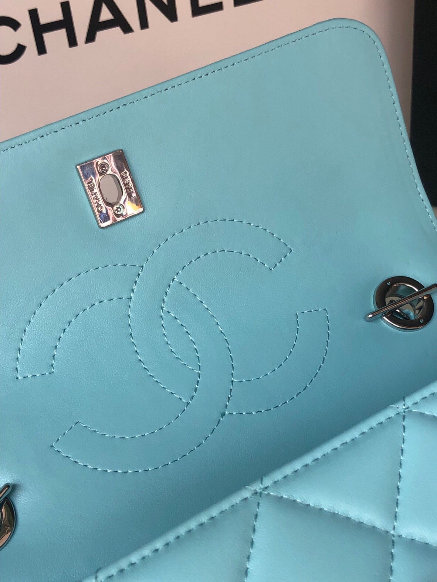Ch*el flap bag with top handle 6.6 × 9.8 × 4.7 in