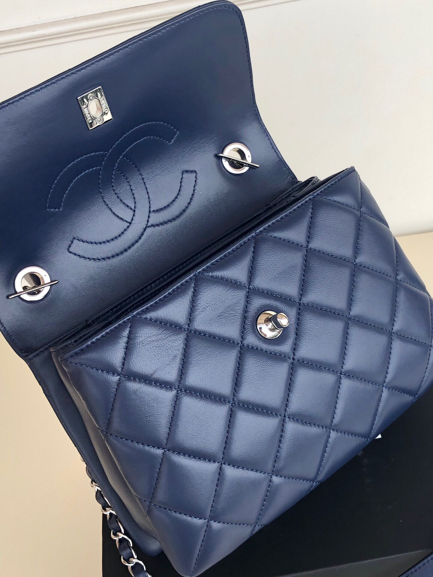 Ch*el flap bag with top handle 6.6 × 9.8 × 4.7 in