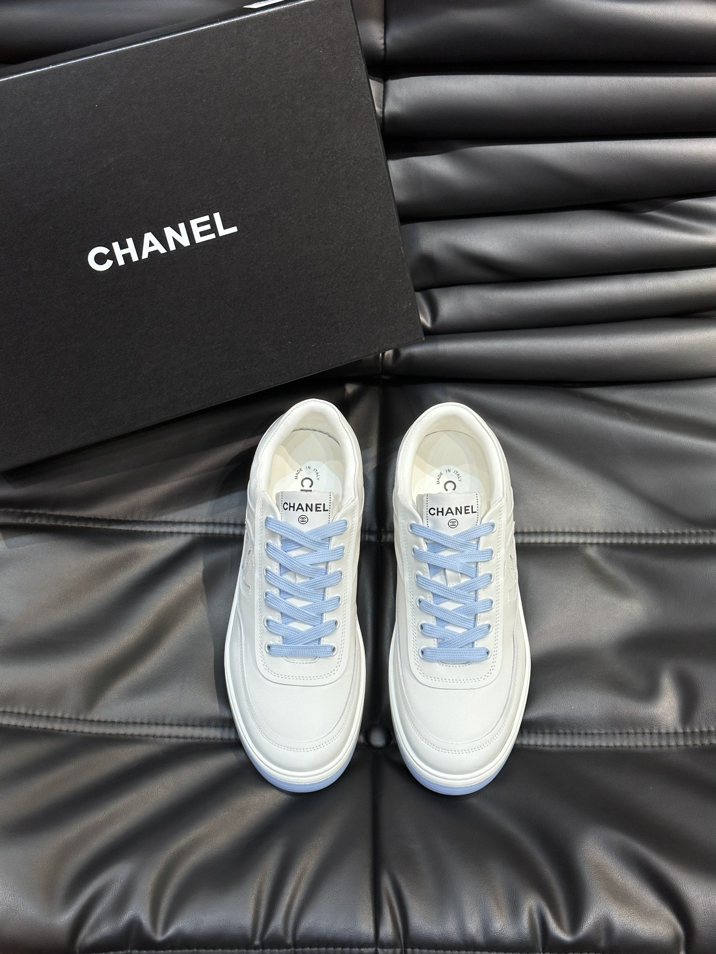 ua Ch*el sneaker calfskin
