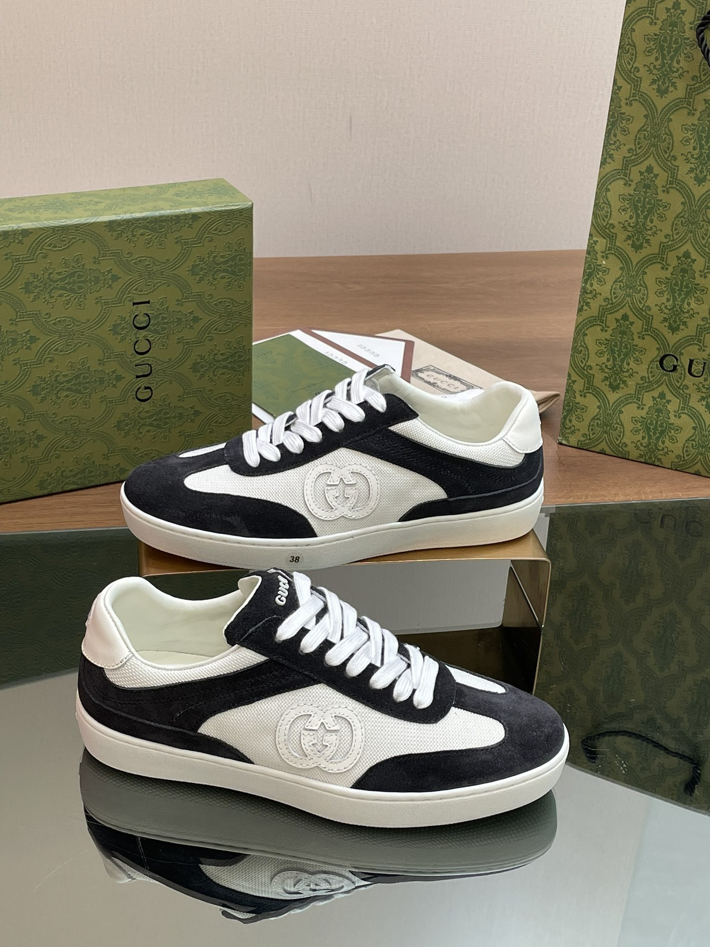 ua G*u*i interlocking g sneaker black and white