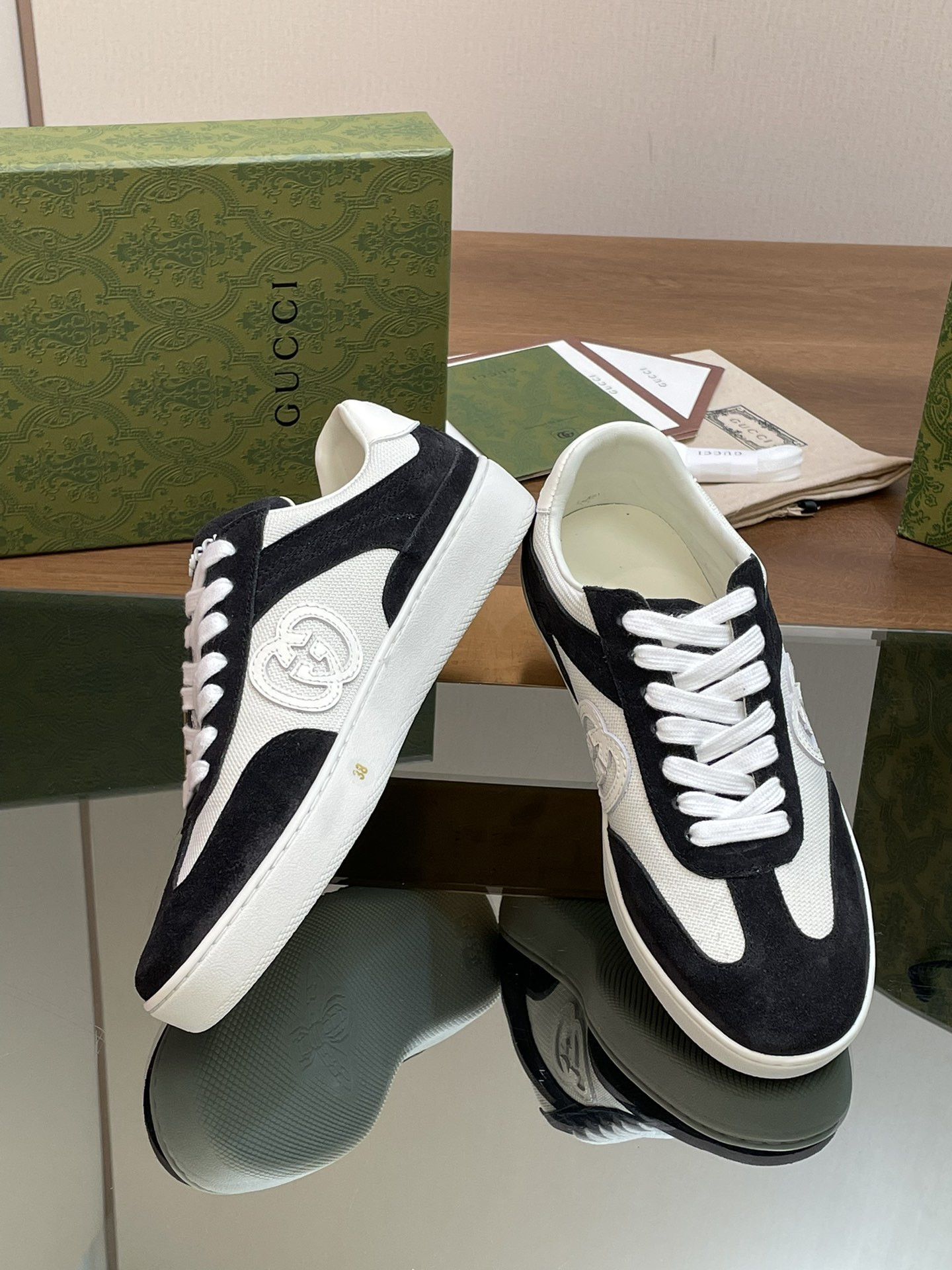ua G*u*i interlocking g sneaker black and white