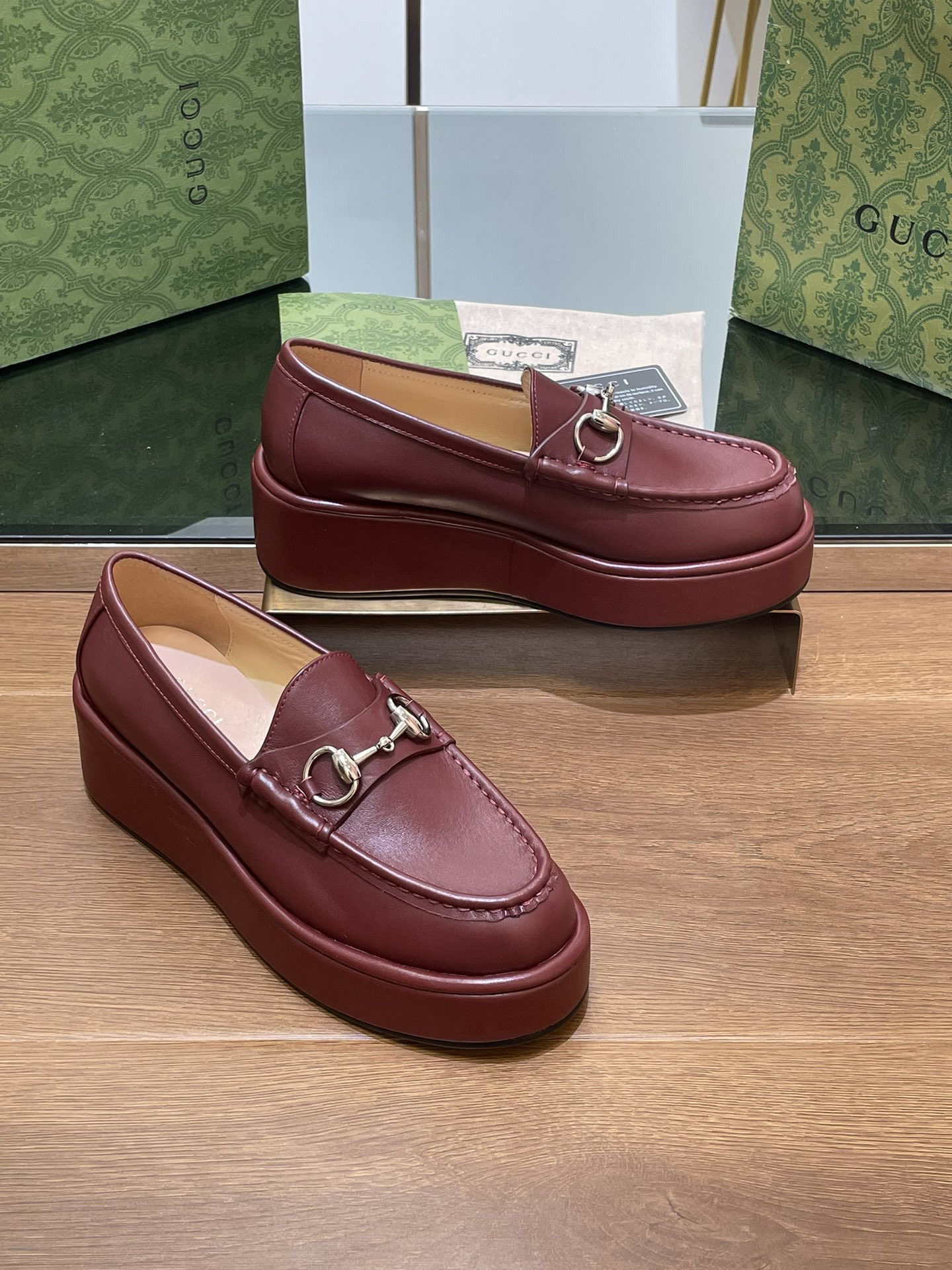 ua G*u*i horsebit wedge loafer