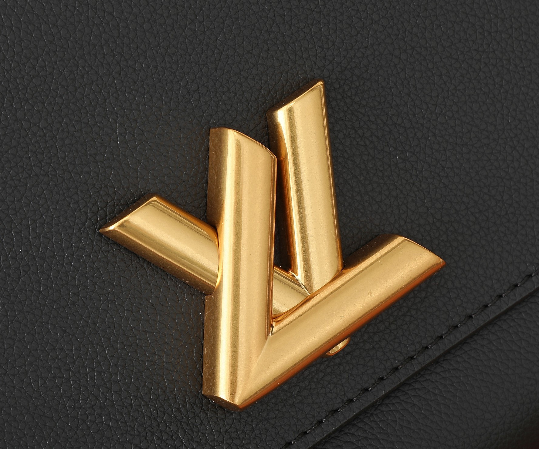 LV Soft Twist M24639 10.6 x 7.5 x 3.5 inches