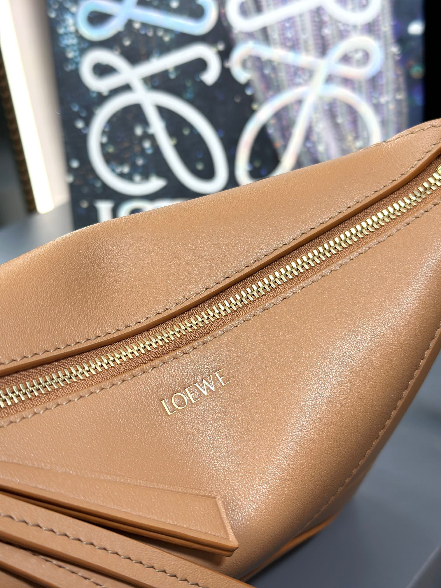L0ew* puzzle fold pouch in shiny nappa calfskin 15.5x23x6.5cm