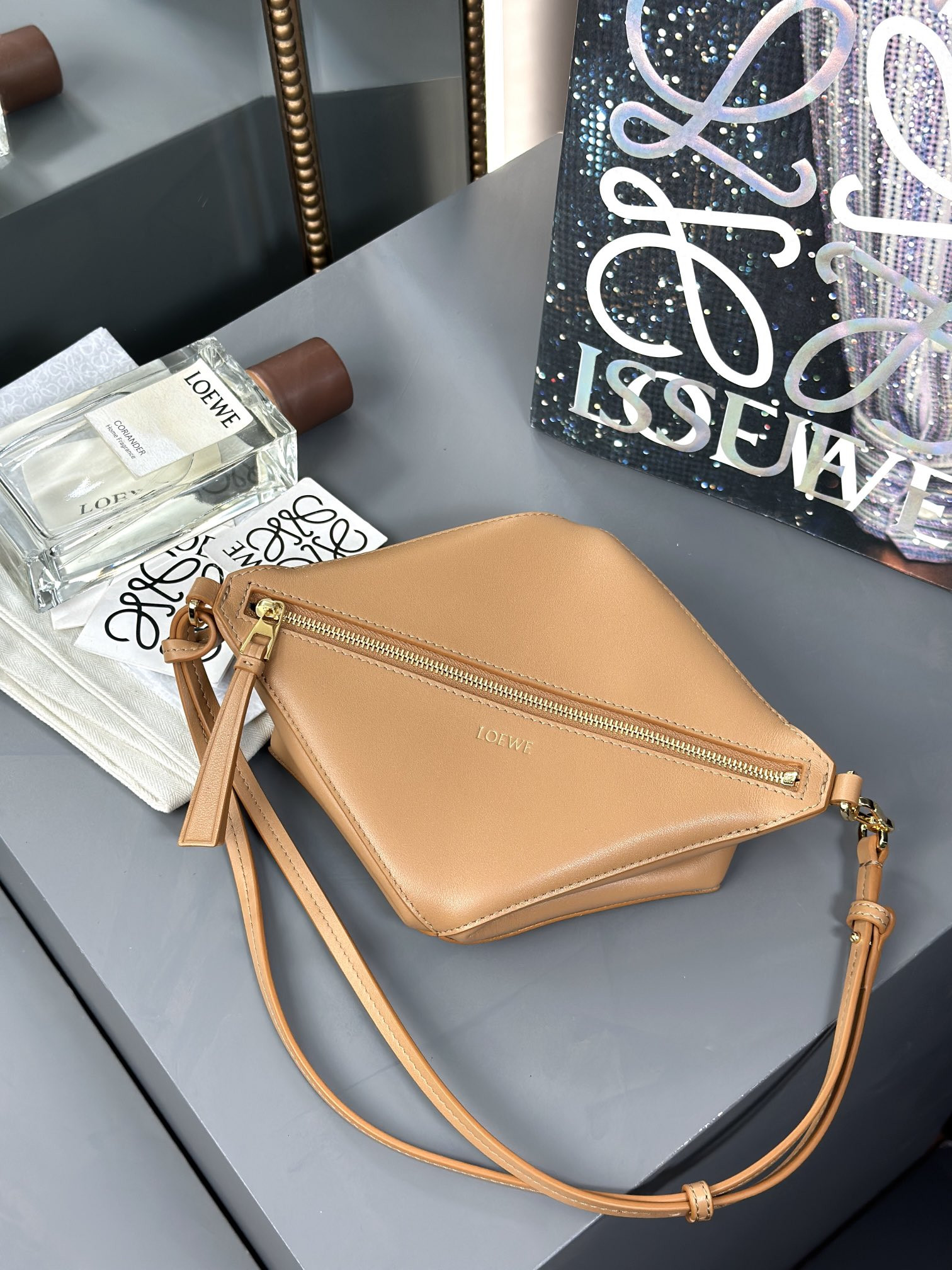 L0ew* puzzle fold pouch in shiny nappa calfskin 15.5x23x6.5cm