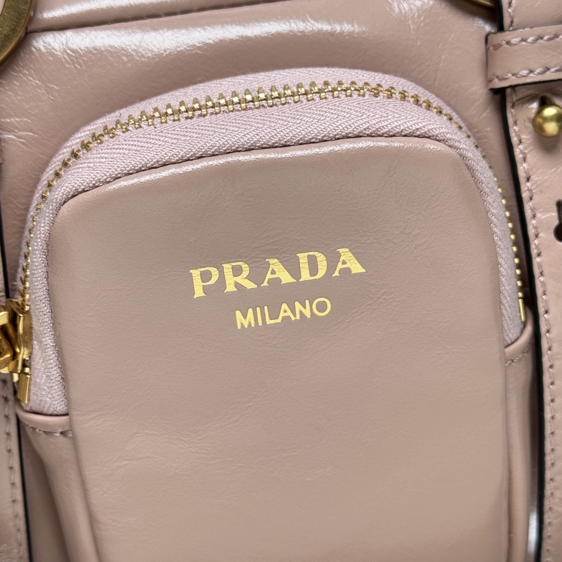 Pra*a dangle medium leather top-handle bag 14x30x13.5cm